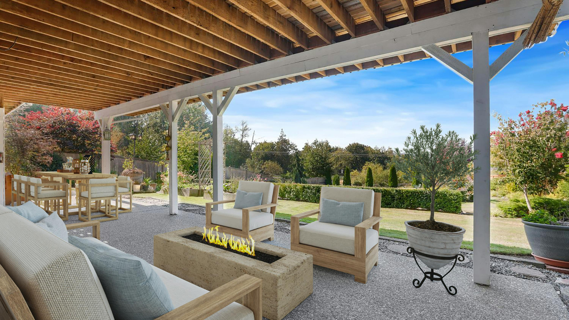 Beautiful summer outdoor living space with a covered patio, fire pit, stylish seating, and lush garden, showcasing the lifestyle potential of a well-maintained home.