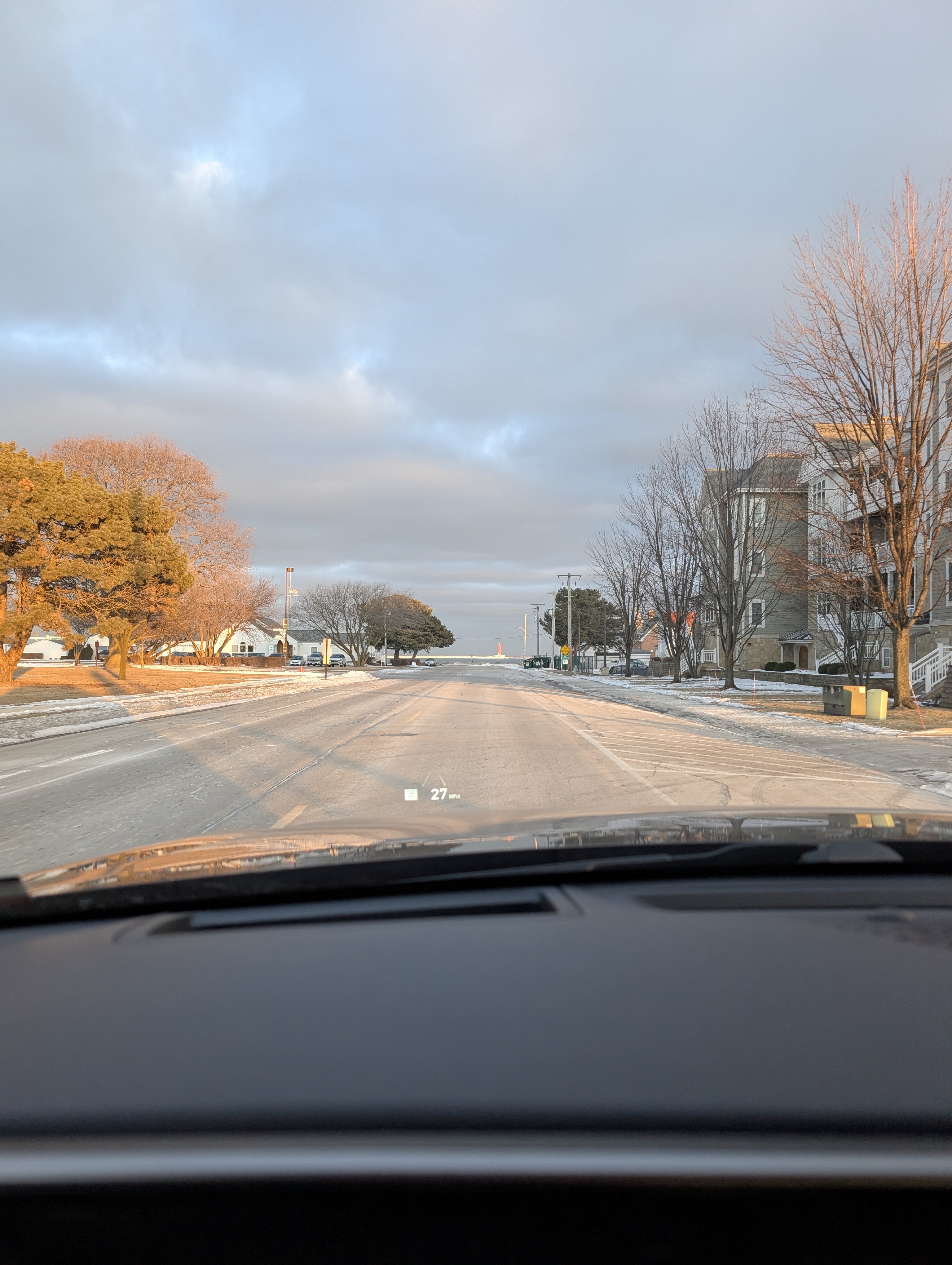 View of Lake Michigan from afar down a street in Sheboygan, WI