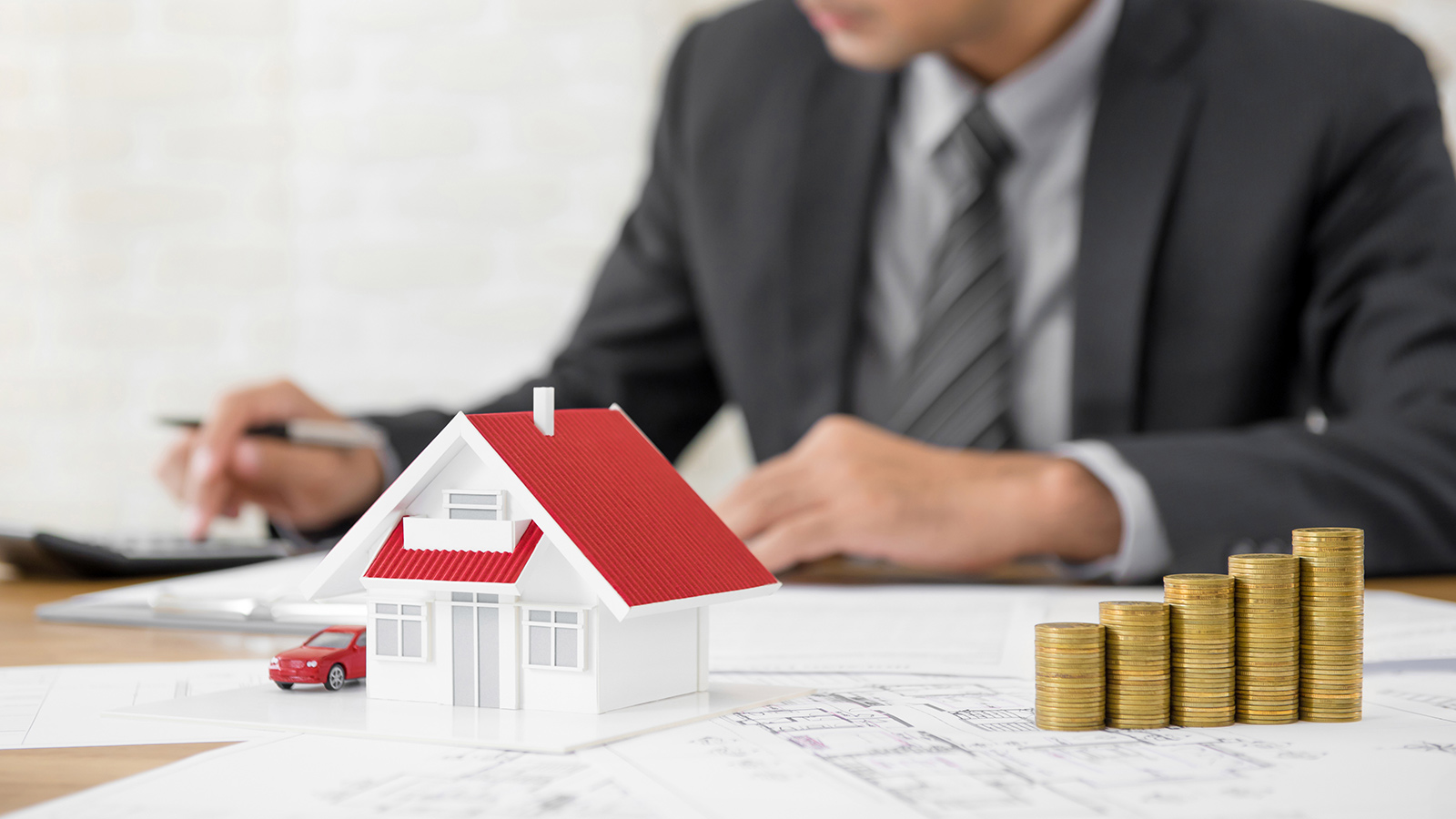 Investing in Real Estate: What You Need to Know Before You Buy header image.