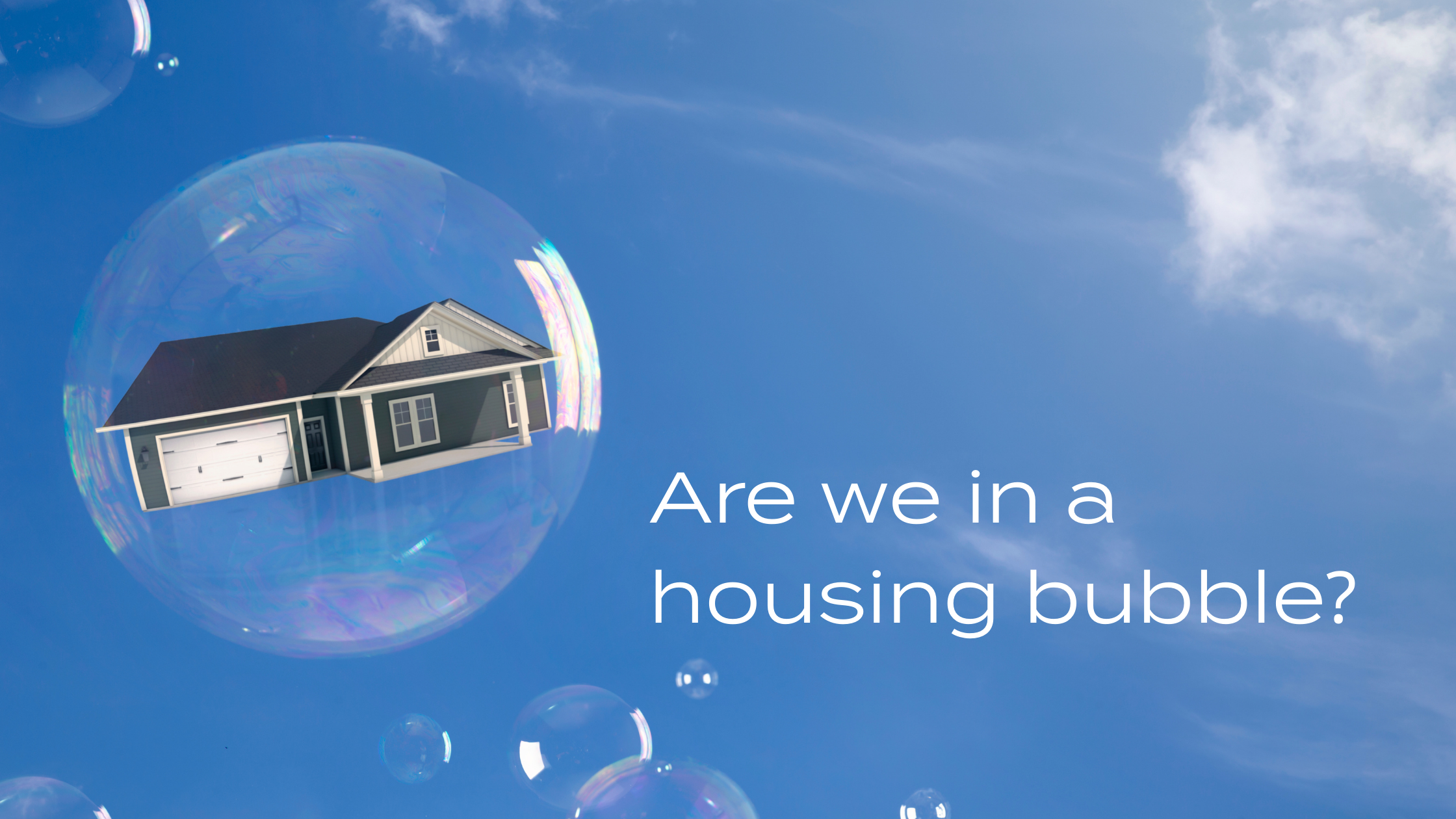 A house floats against the backdrop of a blue sky, encased in a bubble