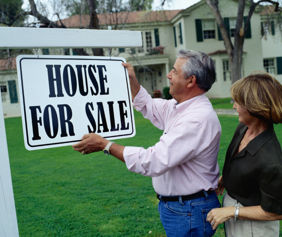 house-for-sale-sign-couple-home-selling-lincoln-select-nebraska