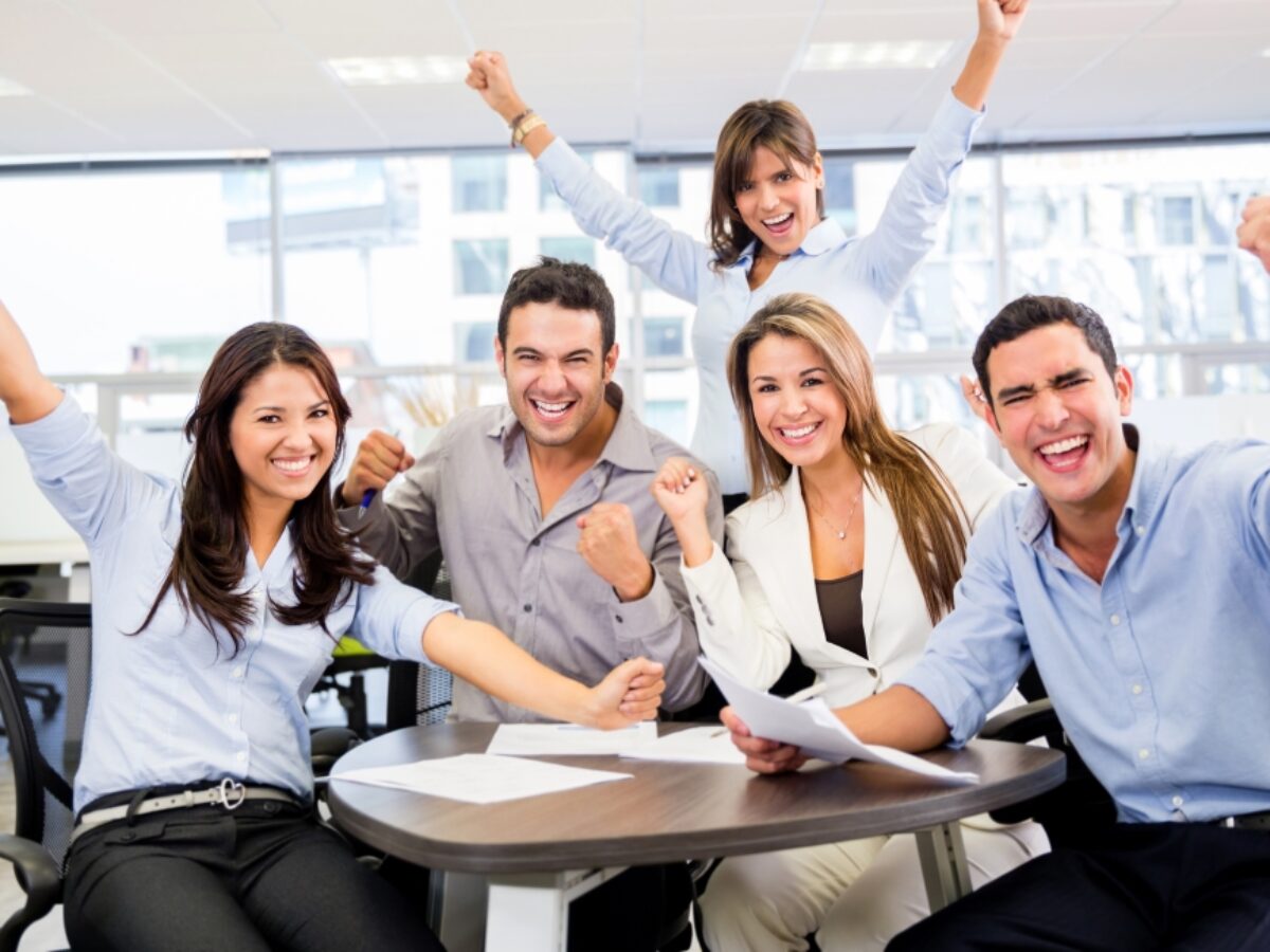 Real estate agents collaborating in a professional Rio Grande Valley team meeting