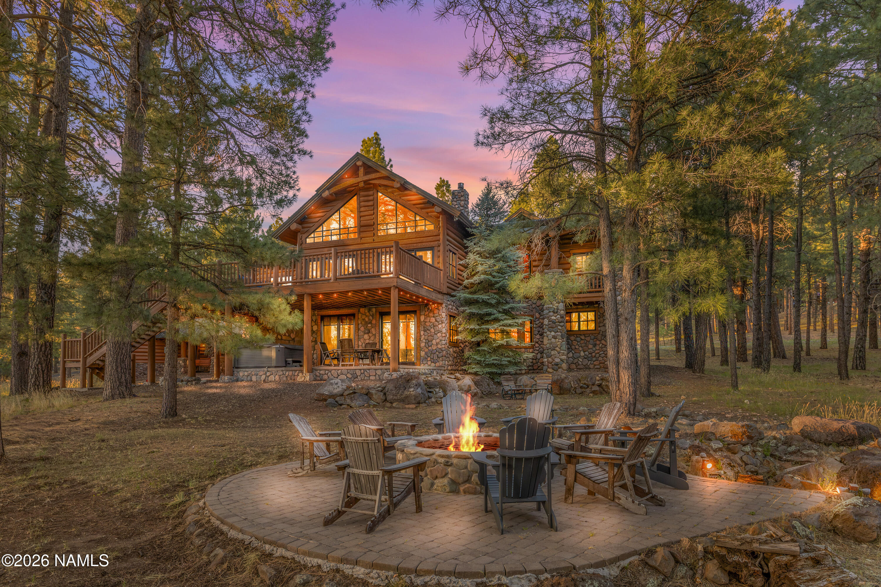 Luxury log home exterior at 1344 Buckhorn Loop in gated Highland Meadows, Flagstaff, AZ