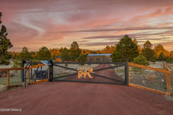 Luxury gated 9-acre horse property backing National Forest in Northern Arizona with mountain privacy and workshop garage