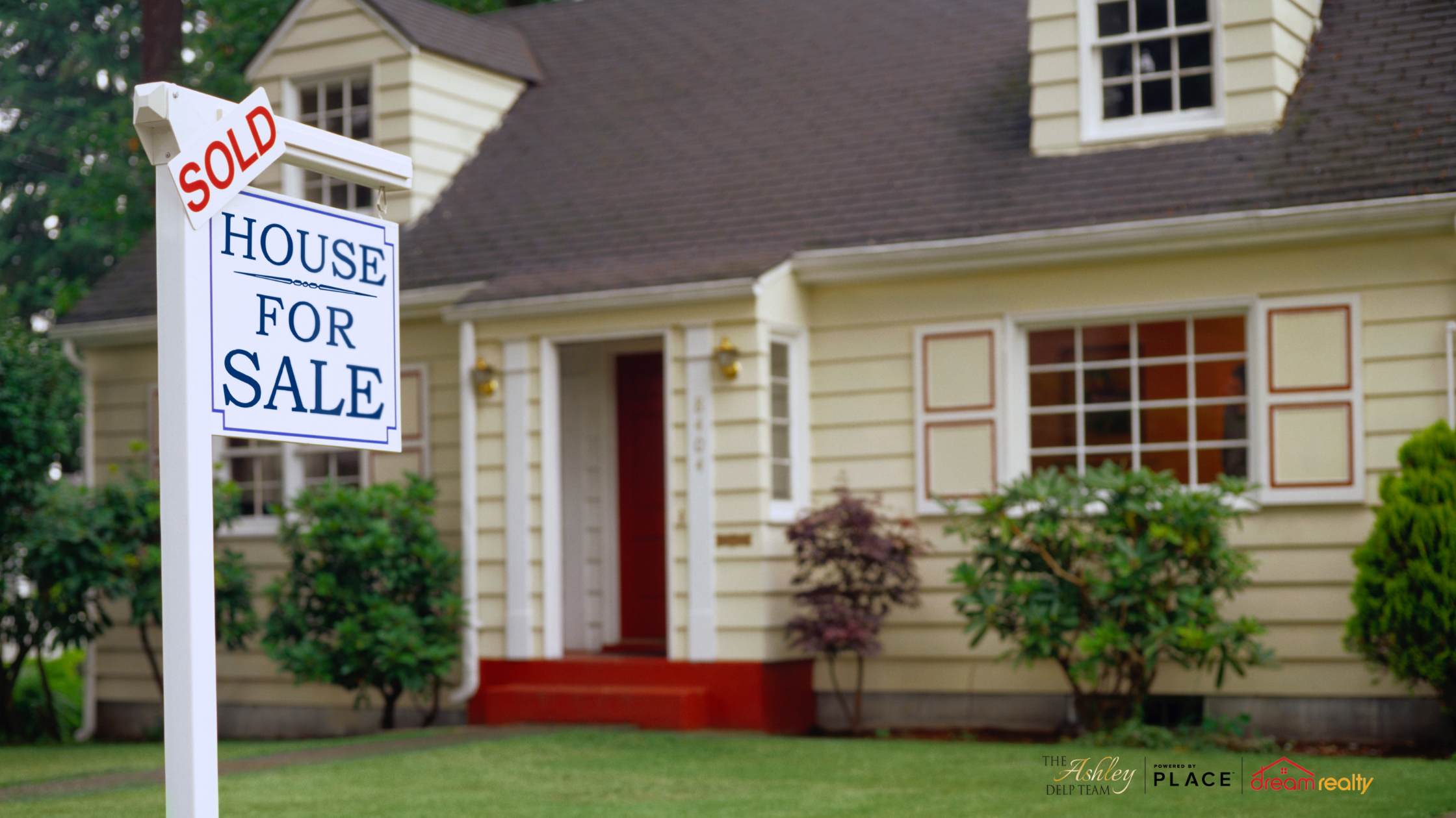 Sold Sign in Front of Home