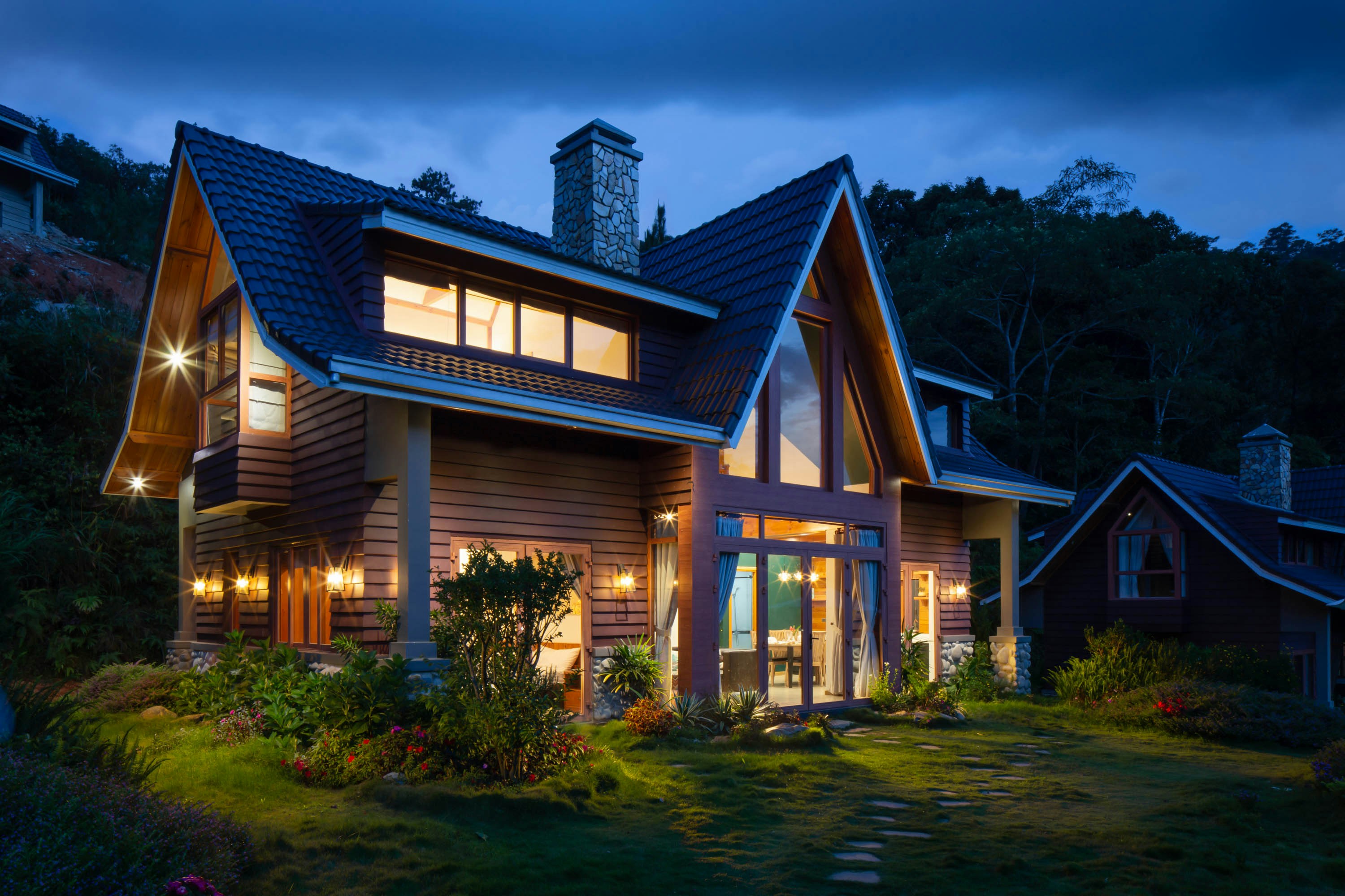 Modern single-family home with well-maintained landscaping, used to illustrate the importance of accurate home valuations beyond online estimates.