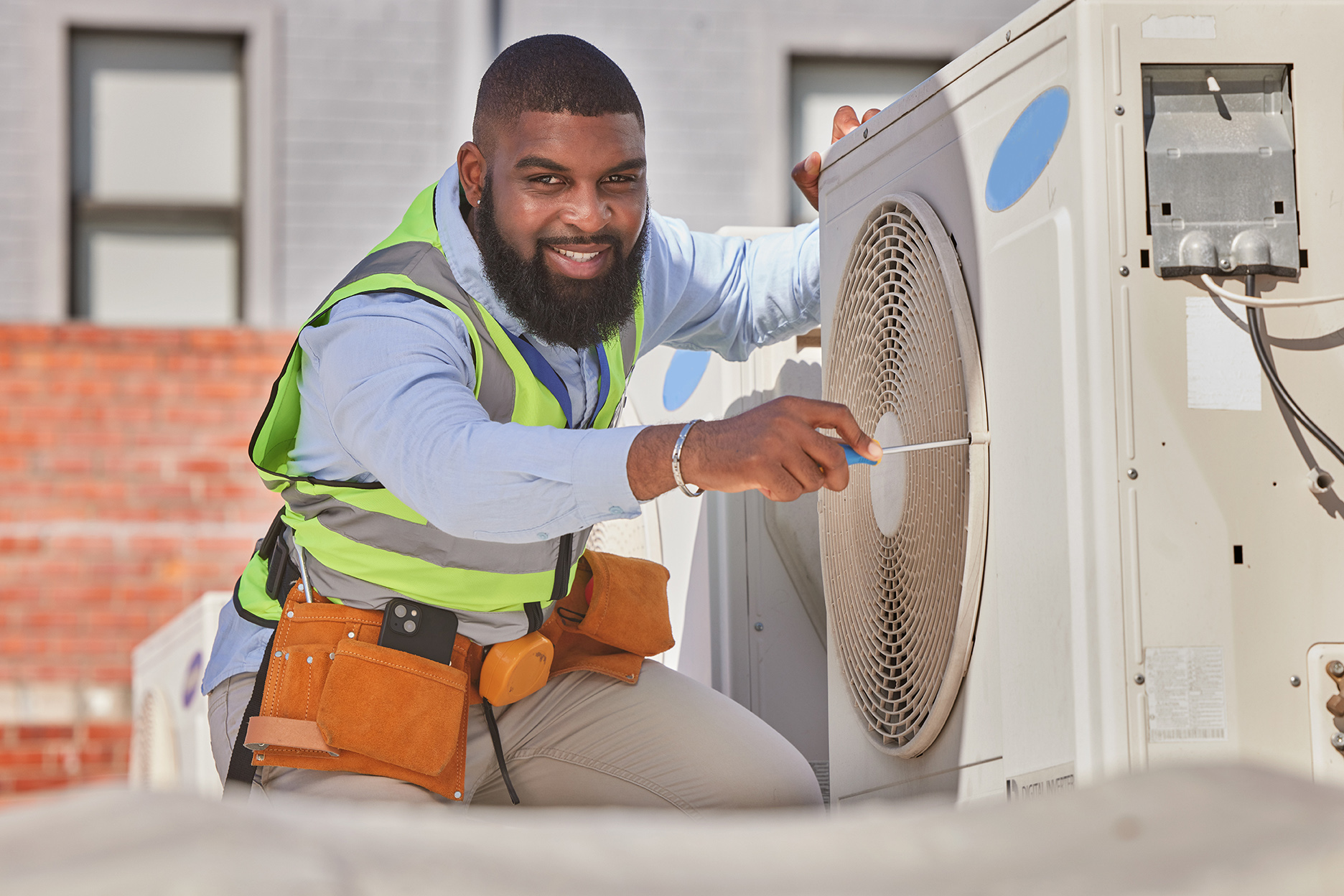 HVAC technician working on a home's hvac unit.