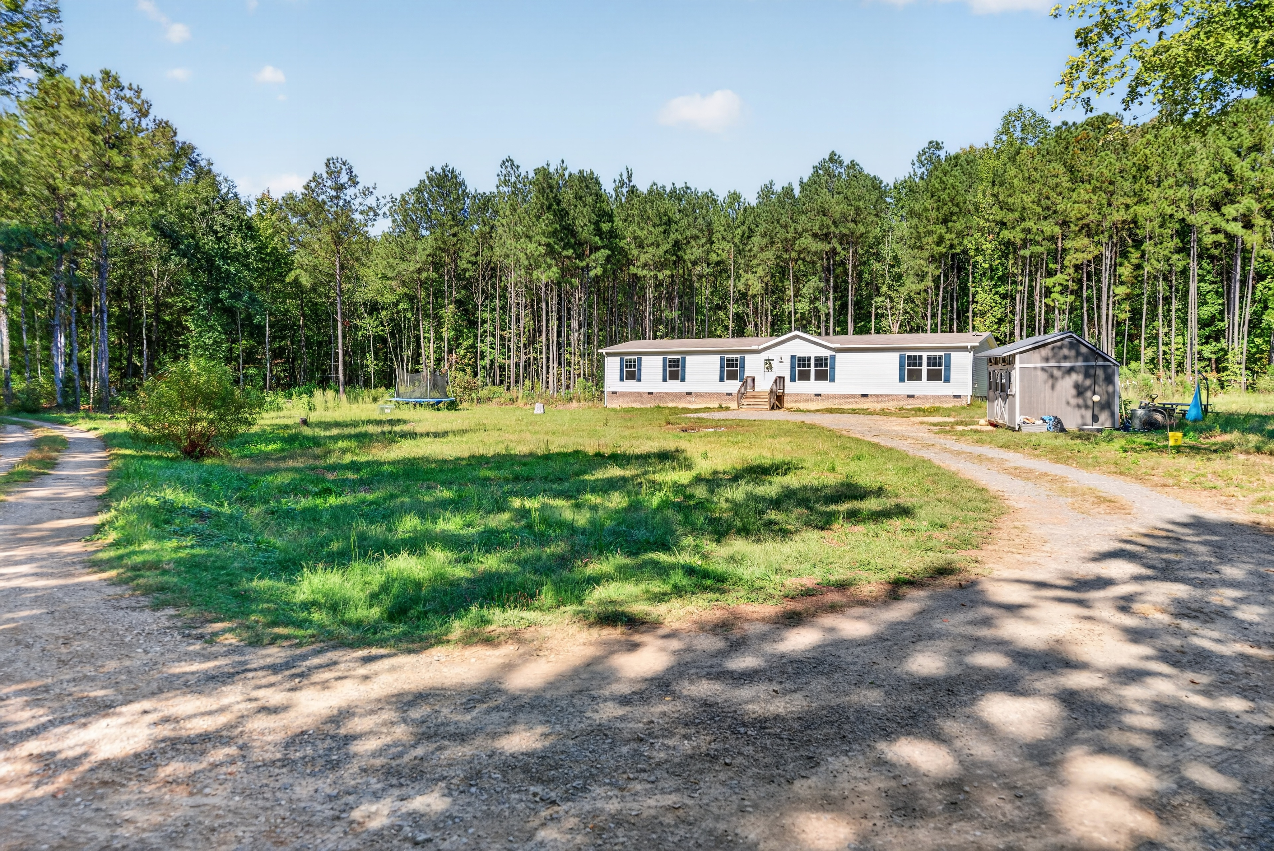 1805 Backwoods Farm Trail: A Newer Home on 14 Private Acres in Stem header image.