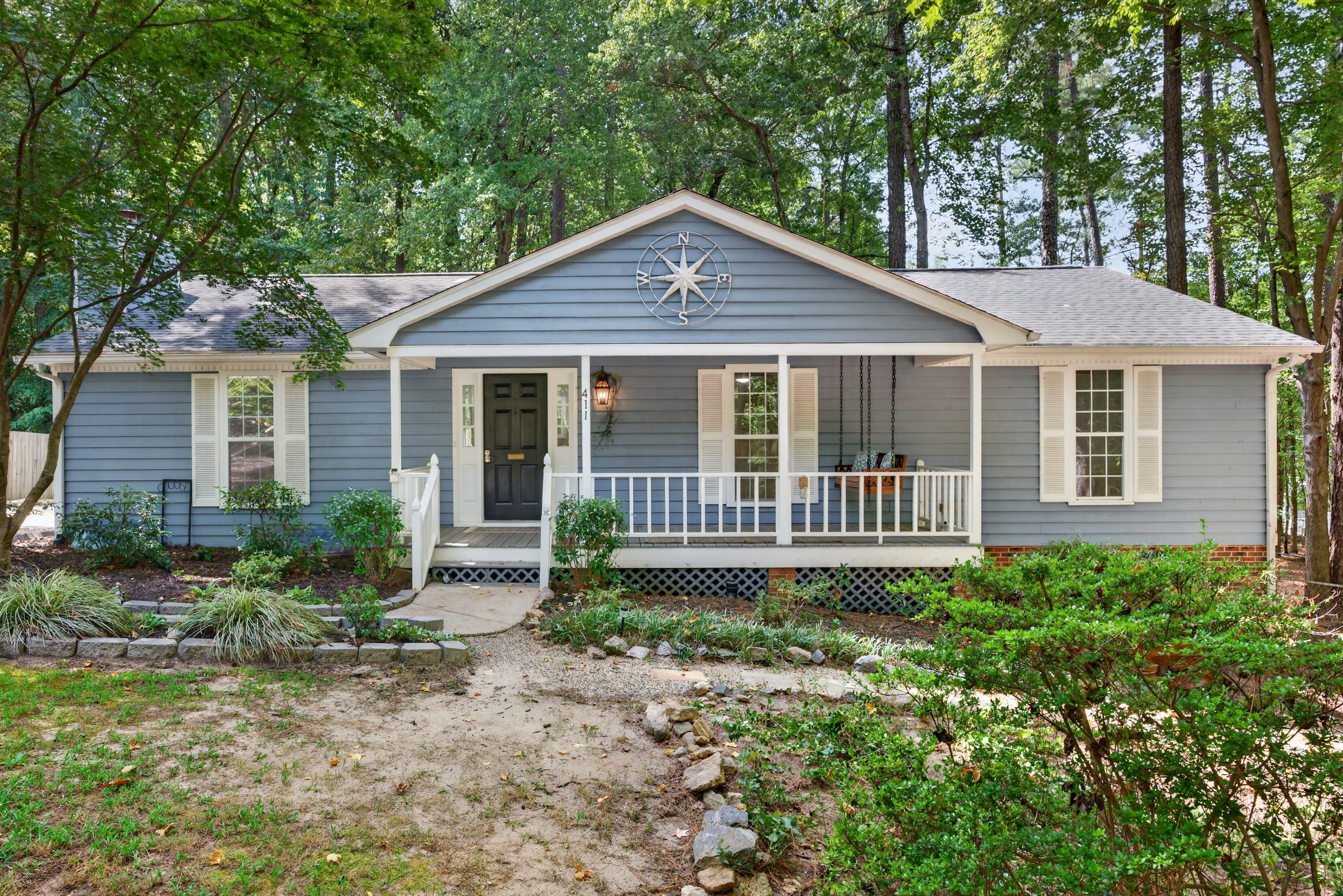 411 W Cedar Ave: Private, Updated One-Level Living in the Heart of Wake Forest header image.