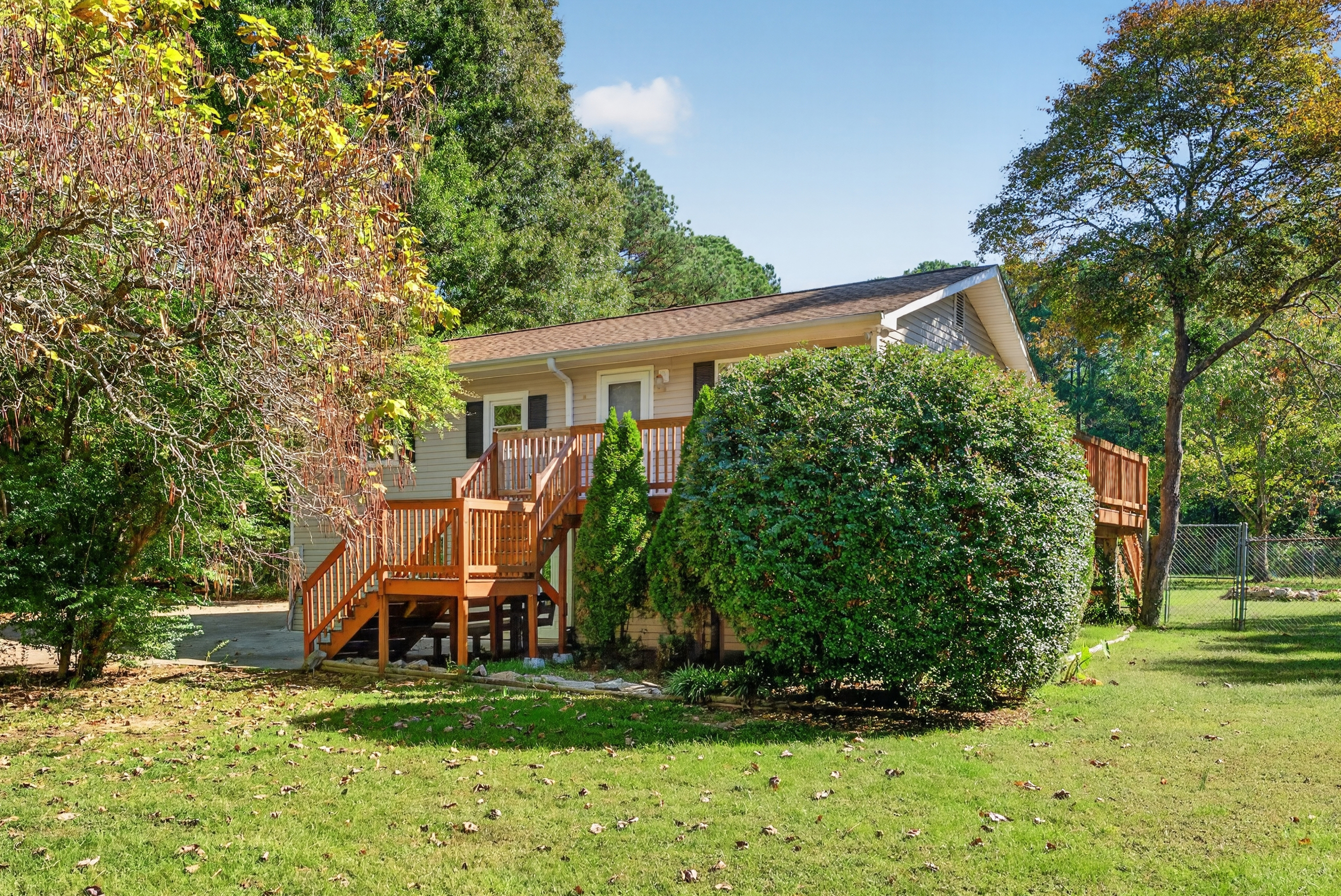 8449 Stephenson Road: A Wrap-Around Deck, a Fenced Yard, and No HOA in Apex header image.