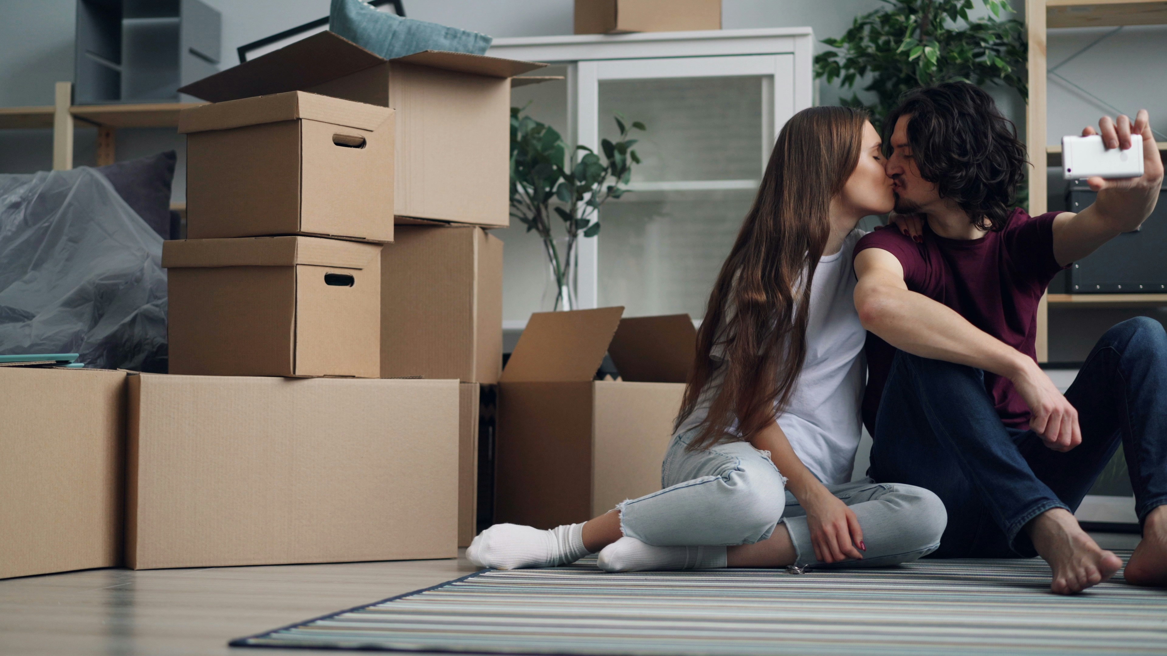 Image of a couple after purchasing there first home