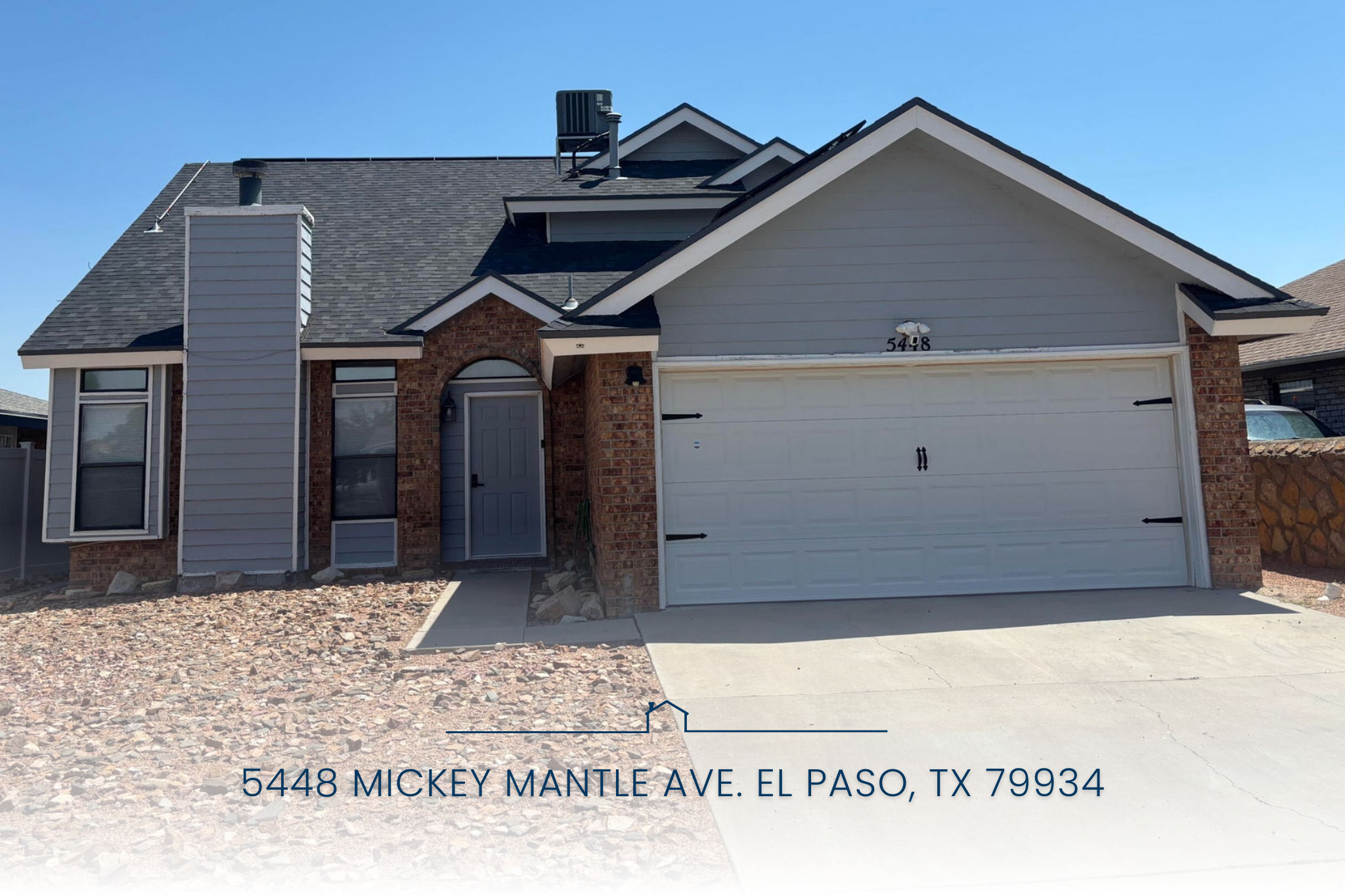Front exterior of 5448 Mickey Mantle Ave El Paso TX home for sale with two-car garage and desert landscaping.