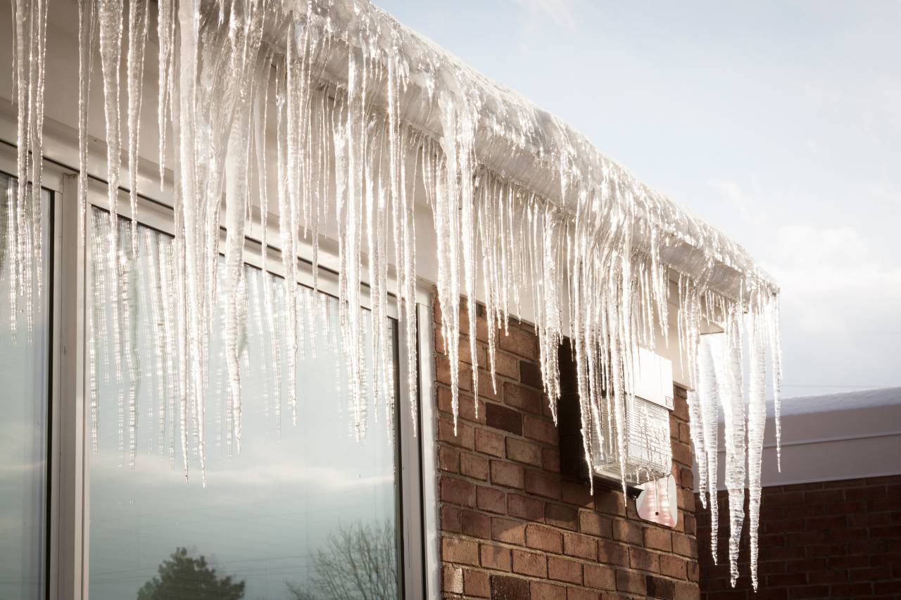 Removing ice dams is one of our winter home maintenance tips.