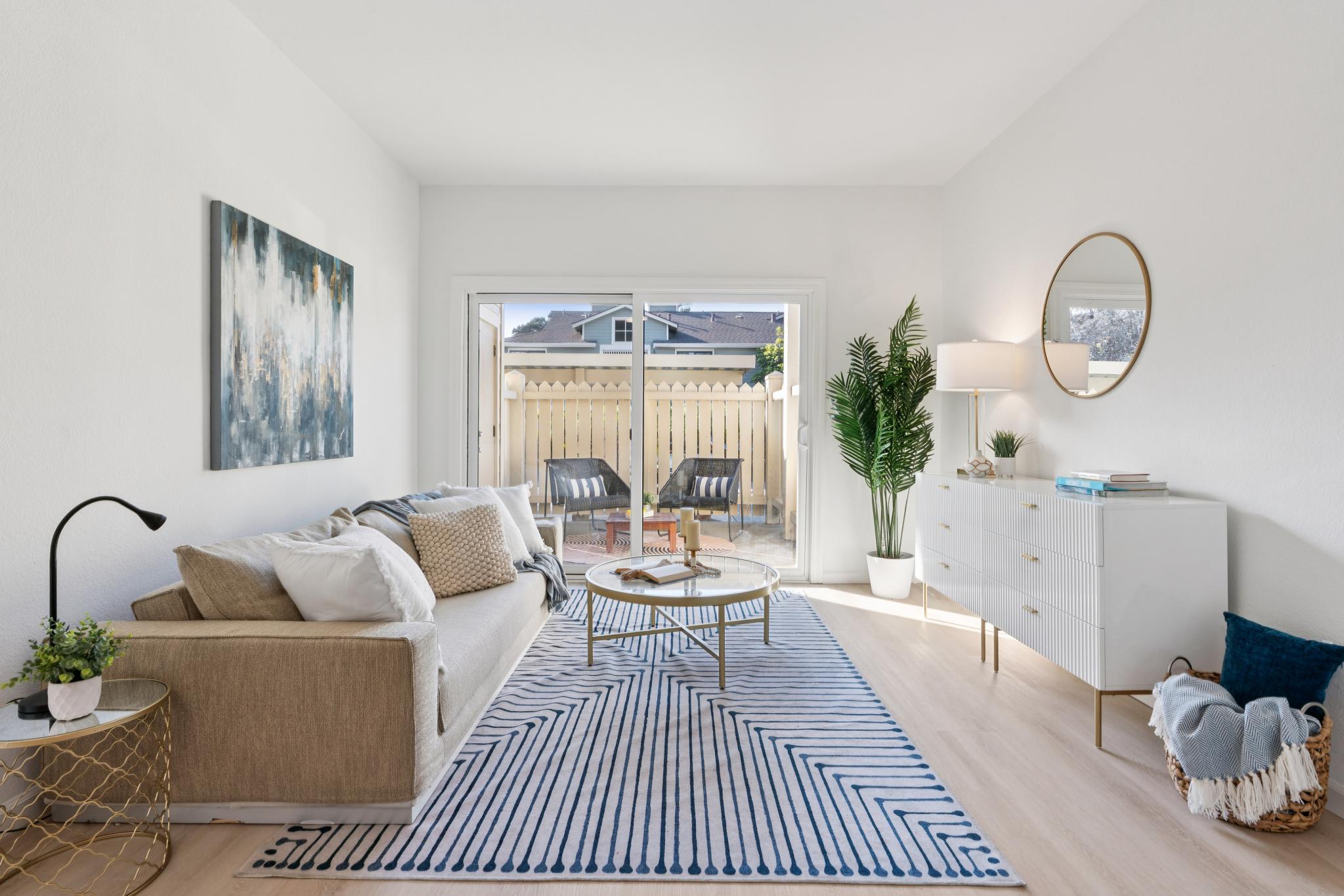 Bright living room with sliding patio doors at 79 Lakeshore Ct, Marina Bay, Richmond