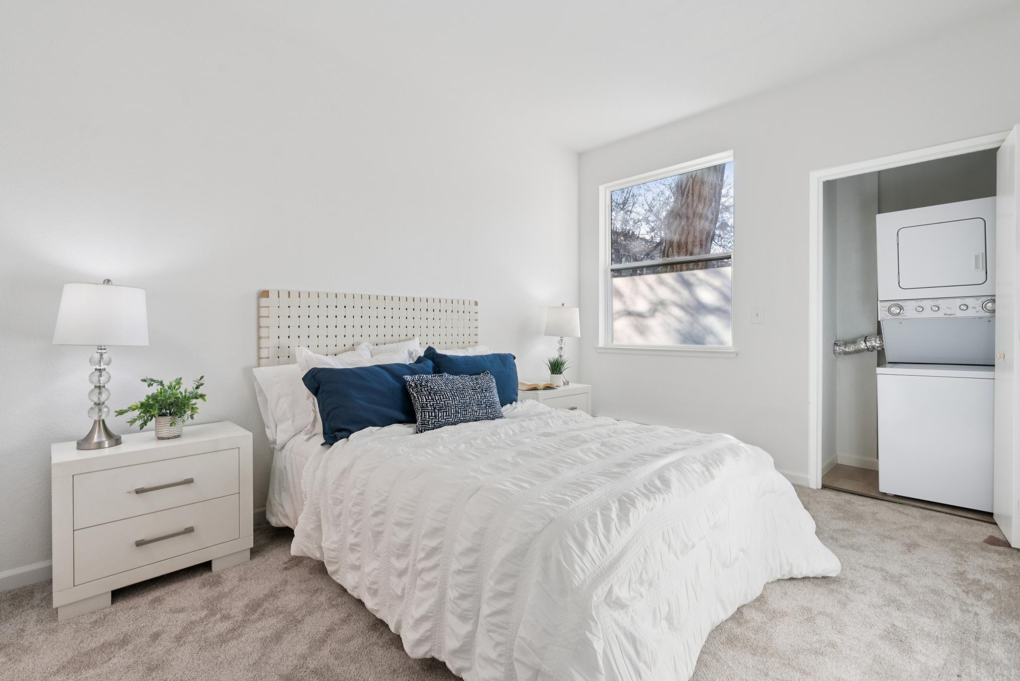 Bedroom with carpet and laundry closet at 79 Lakeshore Ct, Richmond