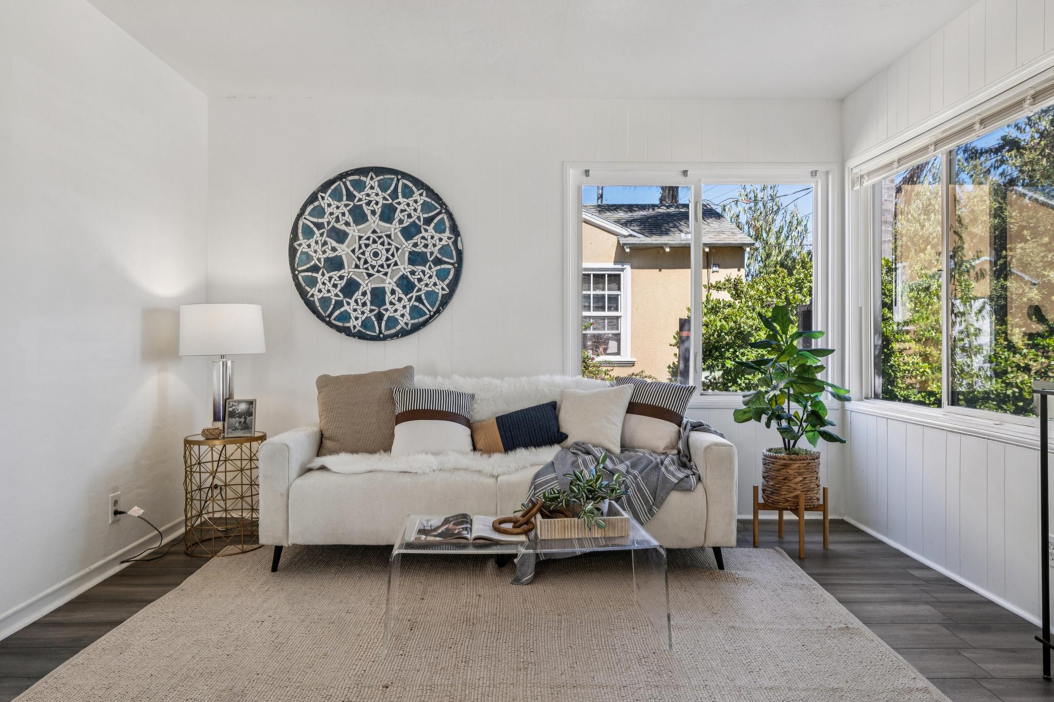 Bright living room with corner windows at 3417 Maricopa Ave in Richmond, CA
