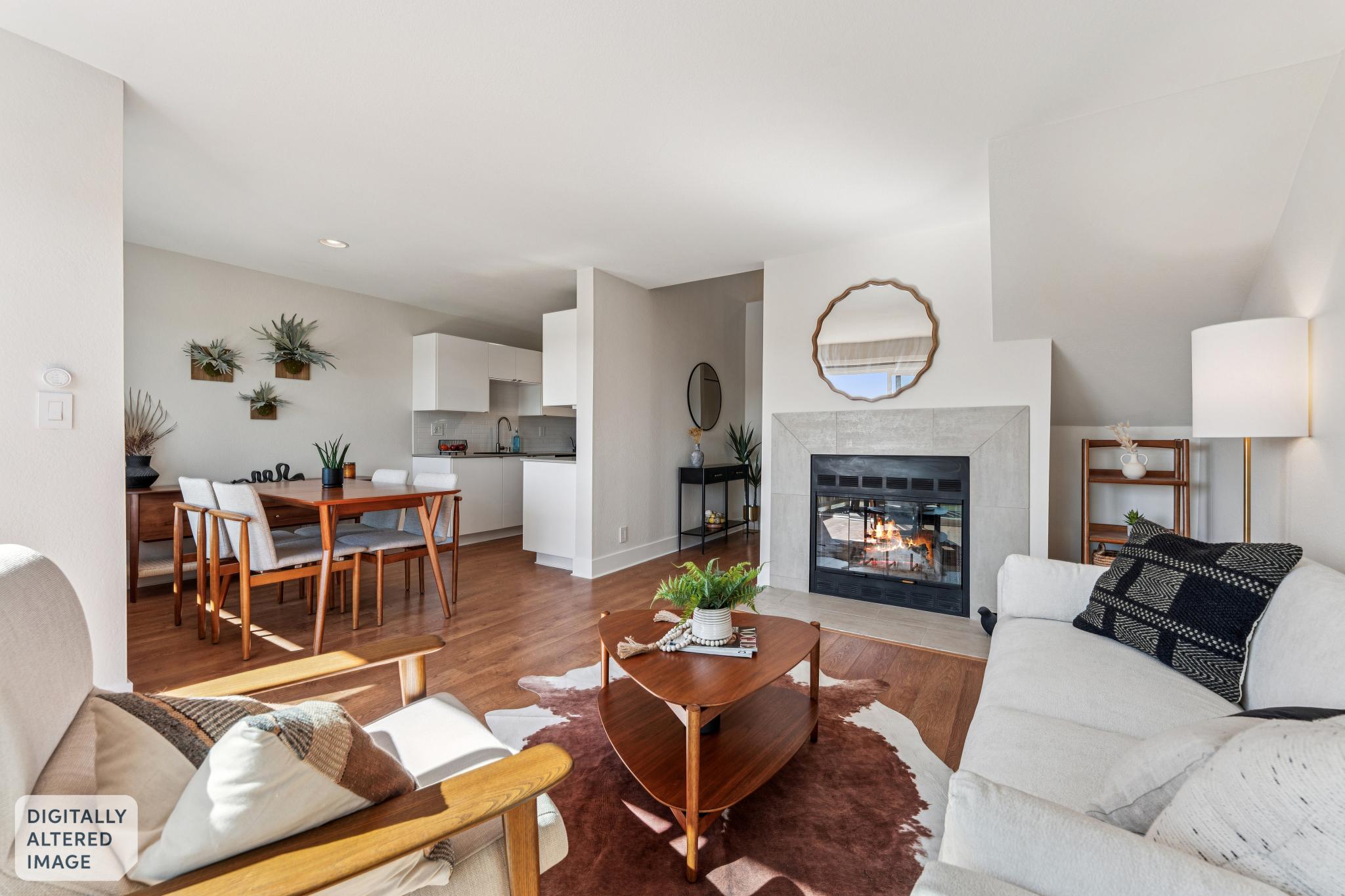 Open living and dining area with fireplace at 194 Lakeshore Ct in Richmond