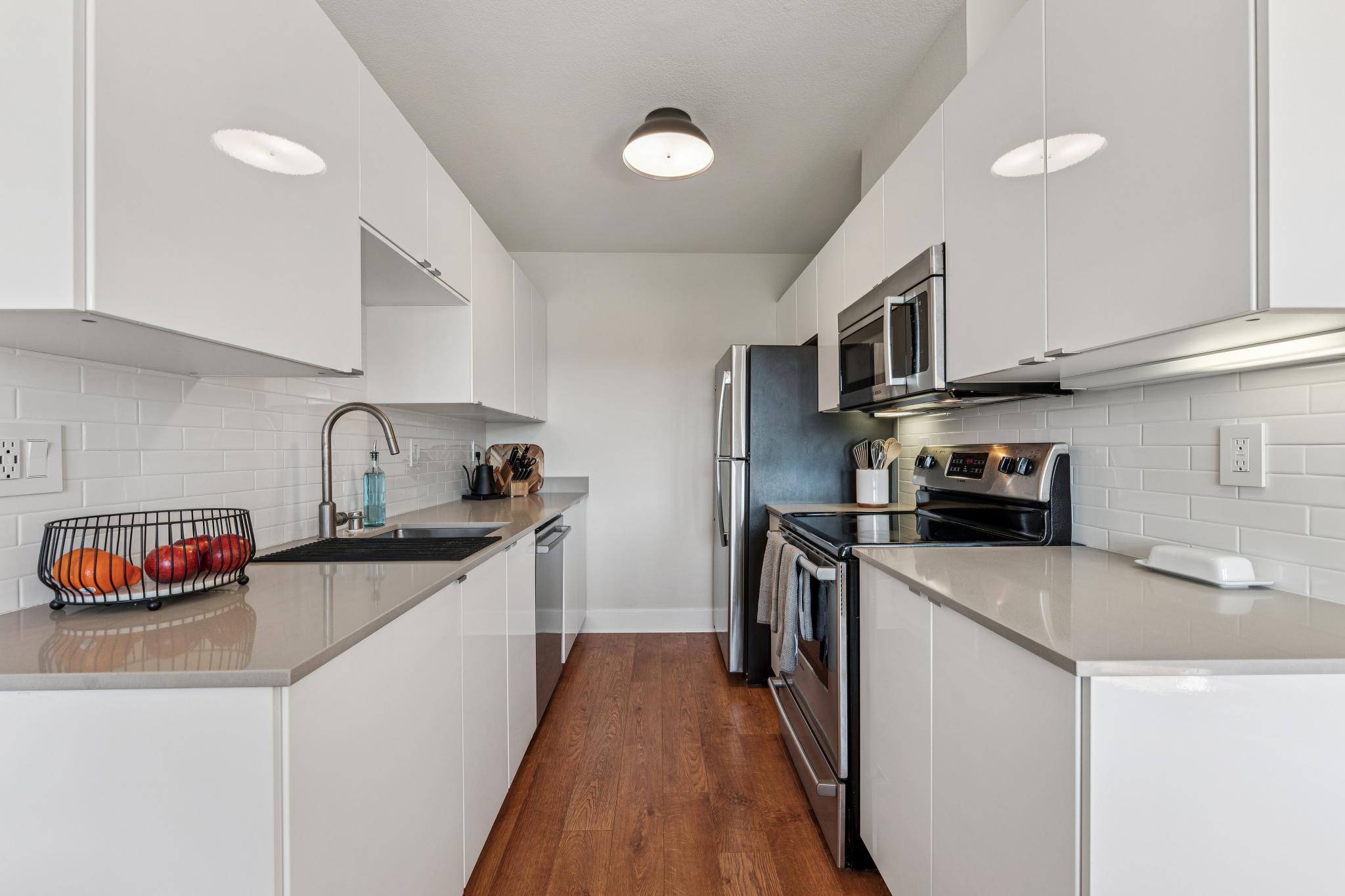 Updated white kitchen with solid-surface counters at 194 Lakeshore Ct in Richmond