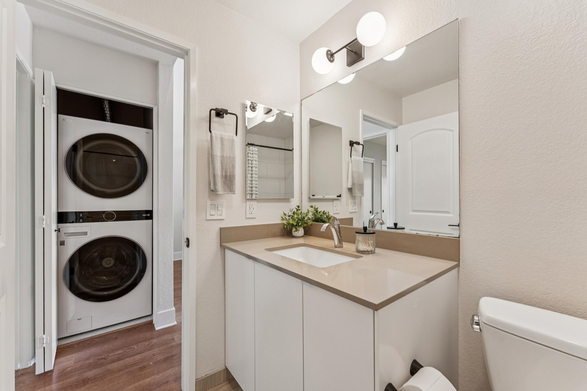 Bathroom vanity and in-unit laundry at 194 Lakeshore Ct in Richmond