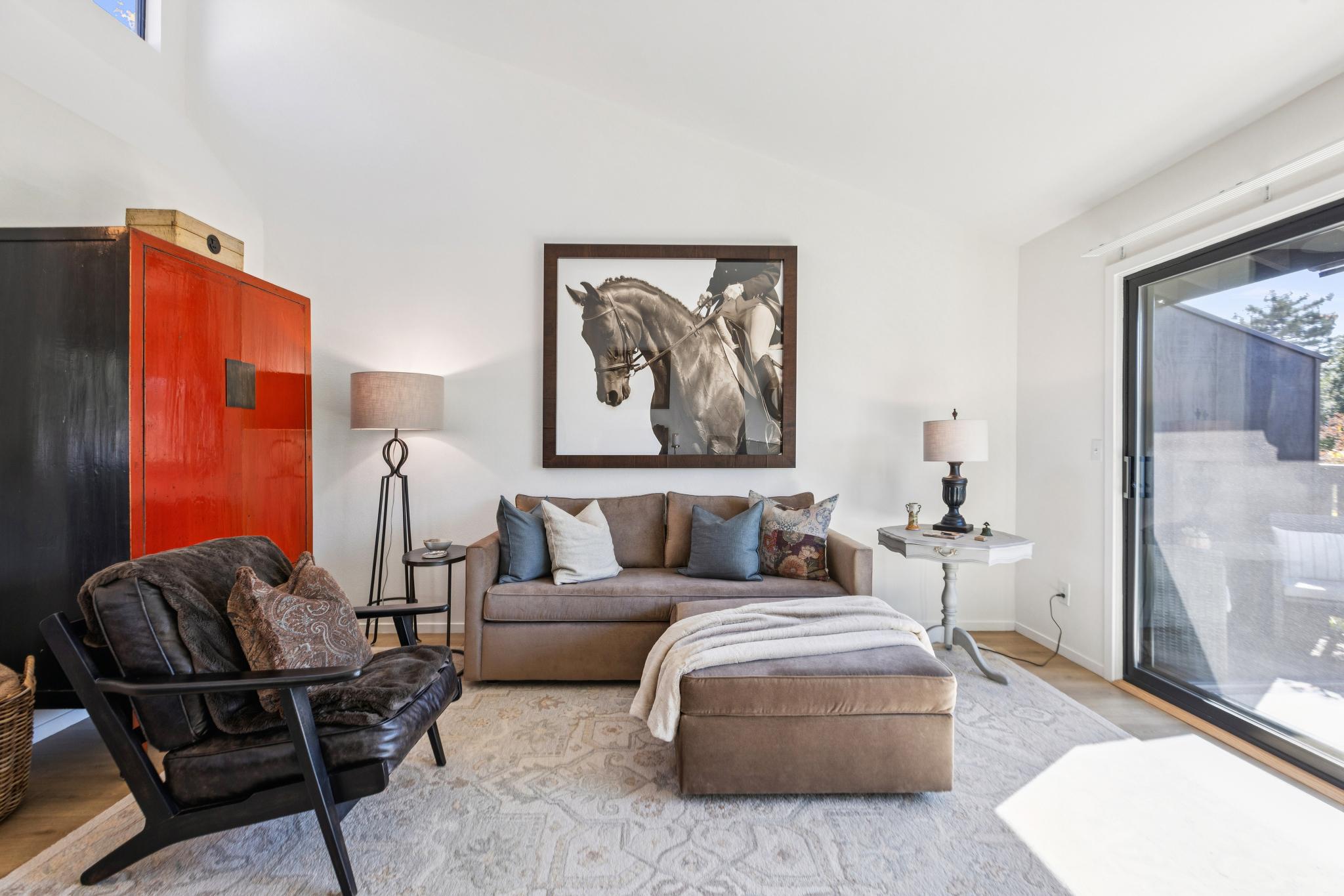 High-ceiling living room with balcony access at 45 Corte Real #1 in Greenbrae