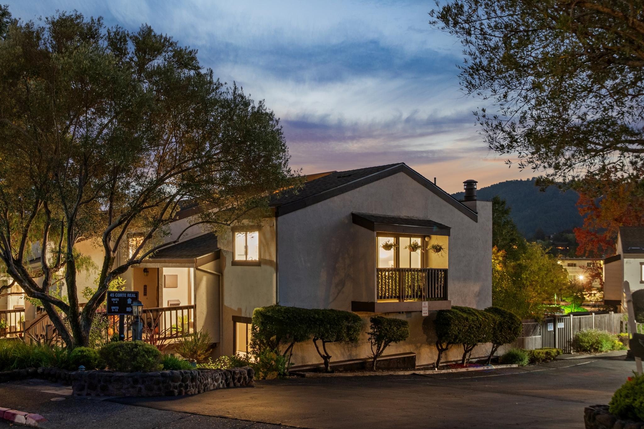 Twilight exterior of 45 Corte Real #1 in Greenbrae, California