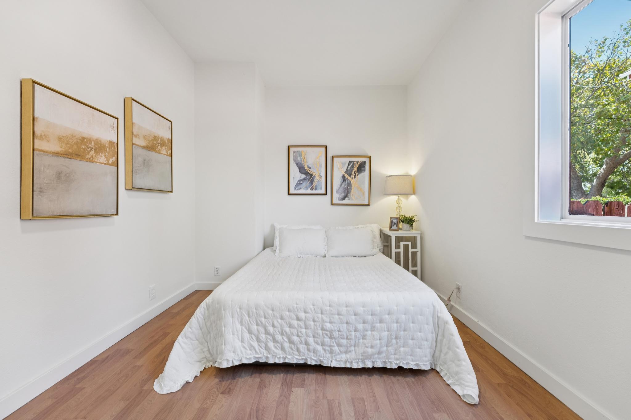 Bedroom at 220 Marina Way in Richmond with wood flooring and natural light