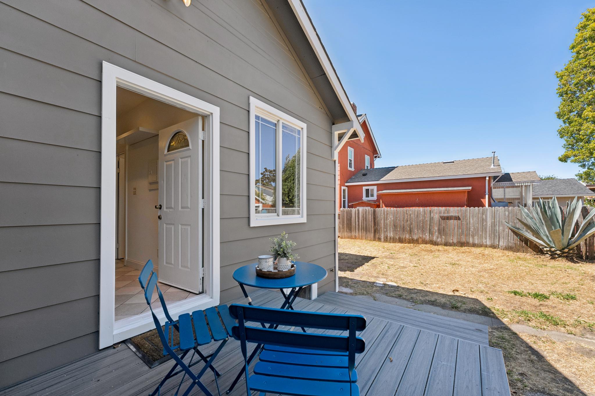 Rear deck at 220 Marina Way in Richmond opening to the backyard