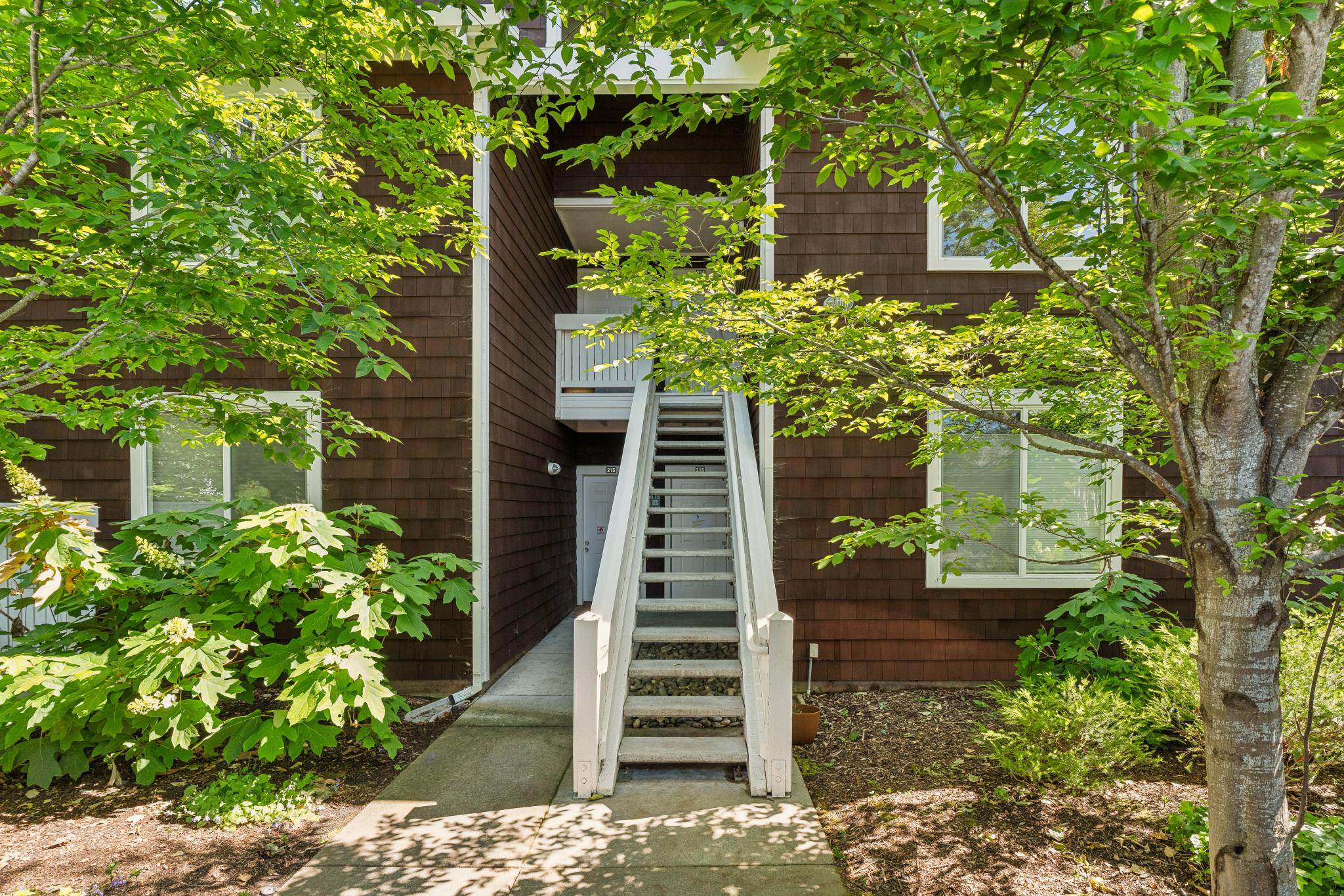 Exterior stairs and landscaped entry to 214 Bayside Ct in Marina Lakes, Richmond, California