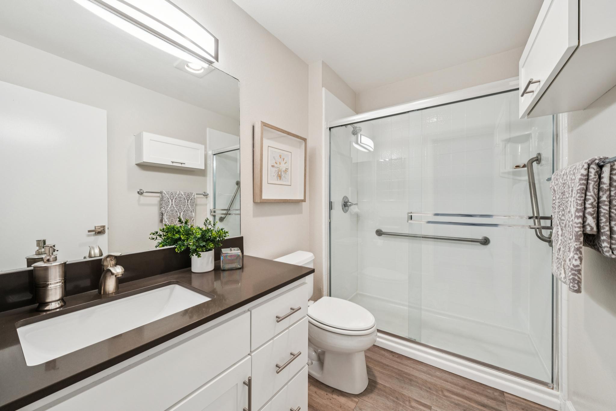 Updated bathroom with glass shower at 214 Bayside Ct in Richmond, California