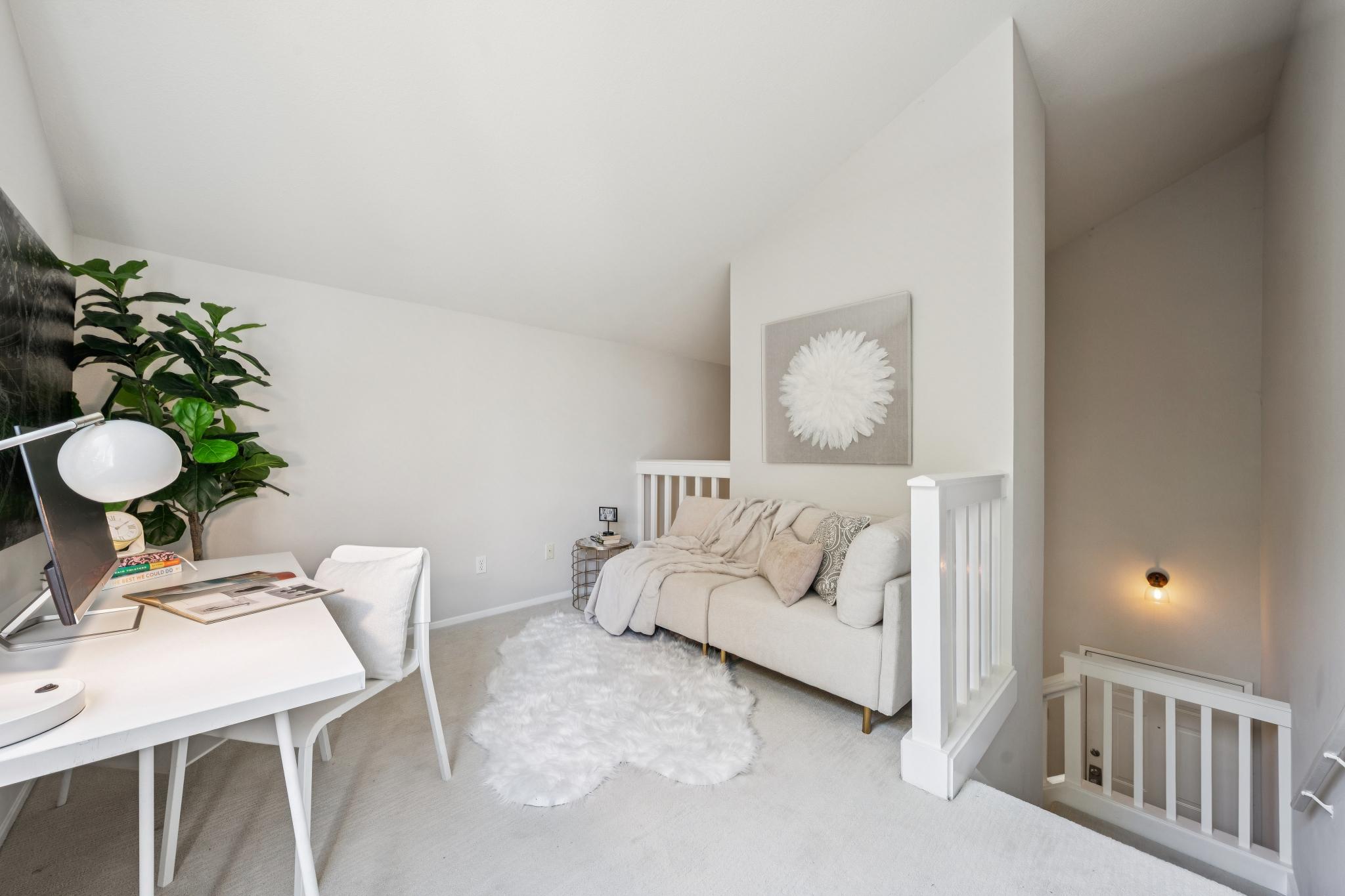 Open upper loft overlooking the living room at 214 Bayside Ct in Richmond, California