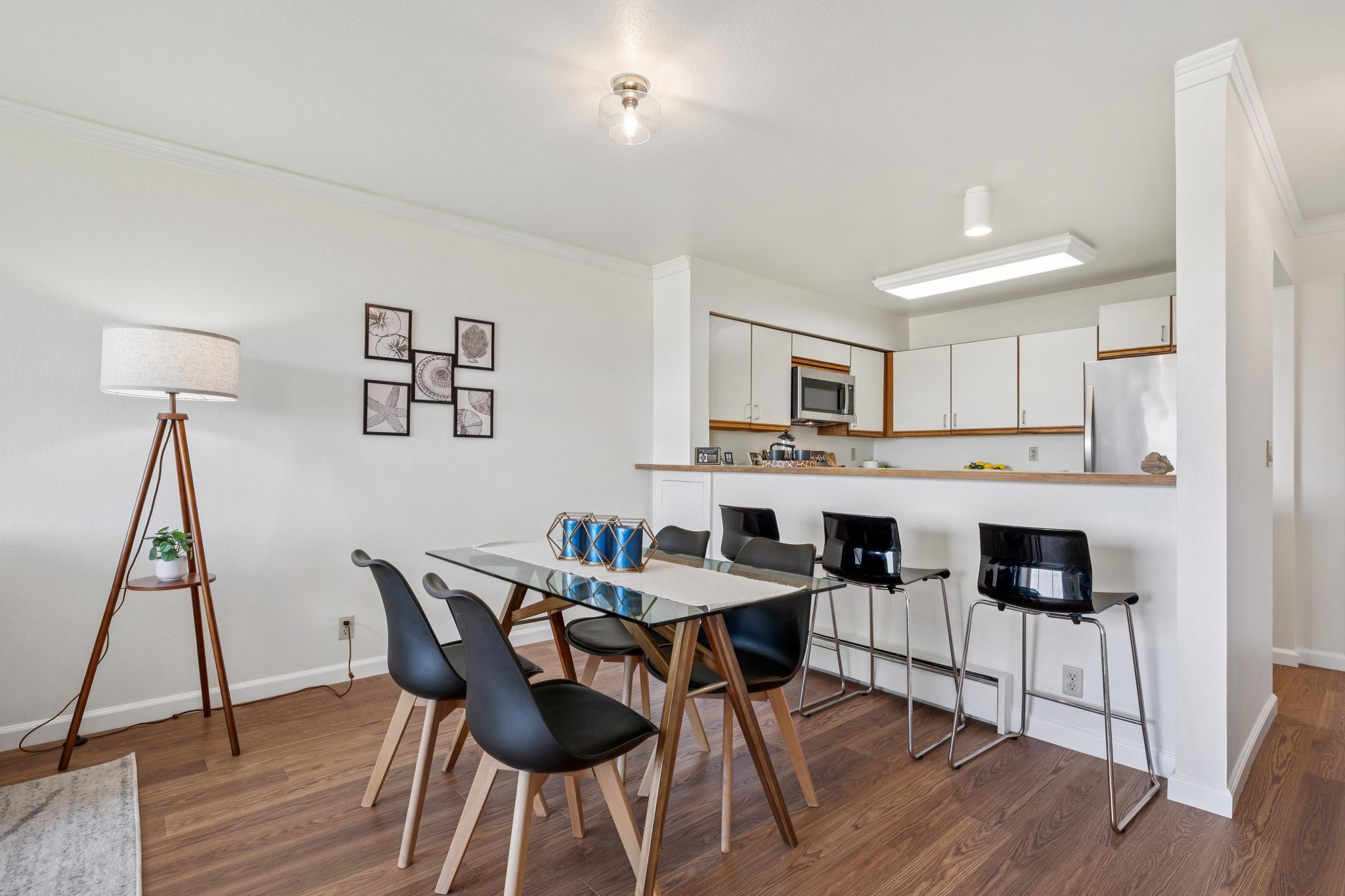 Dining area and breakfast bar at 1205 Melville Sq #304 in Richmond