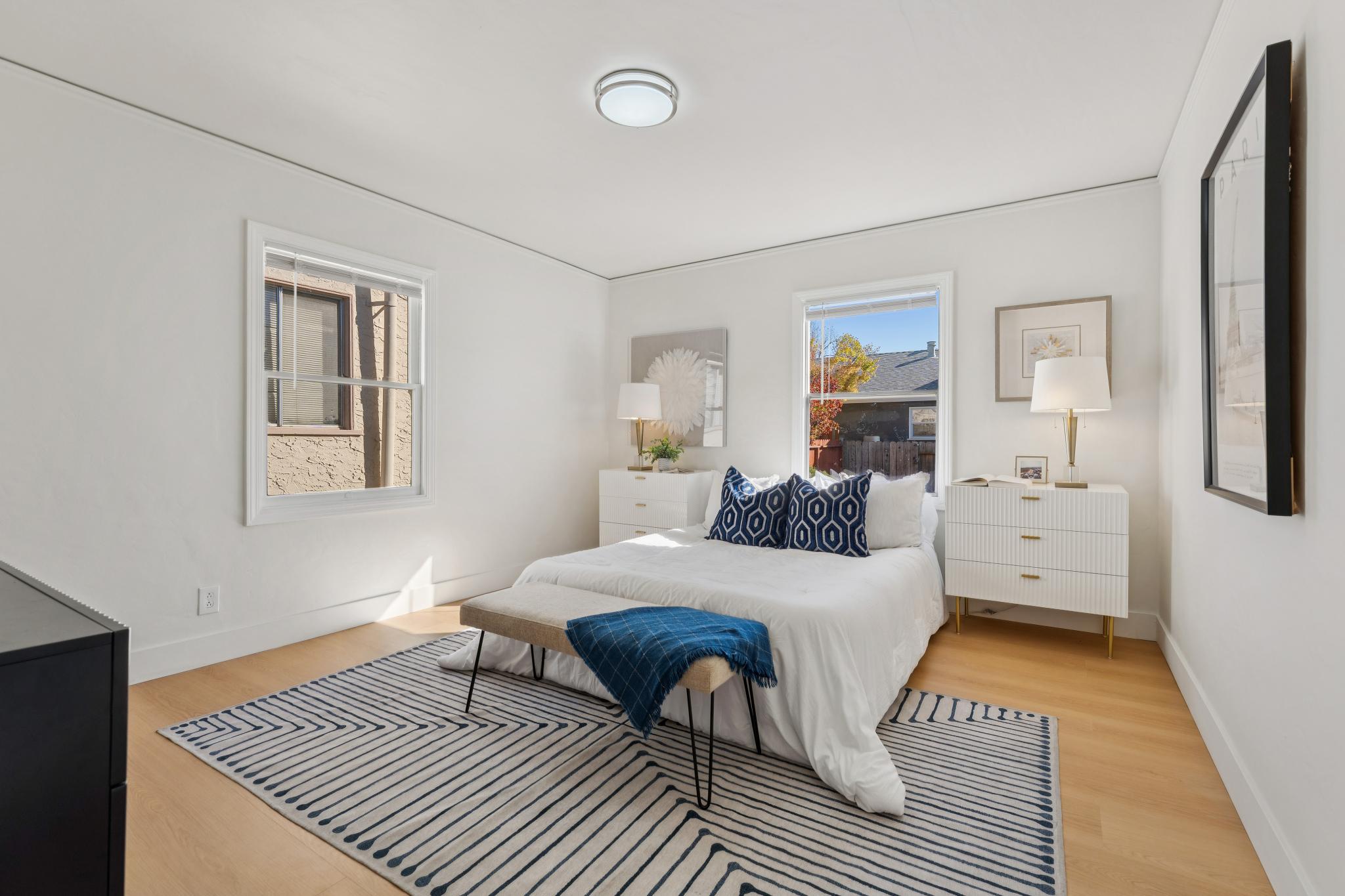 First bedroom with windows on two walls at 3400 McBryde Ave in North and East, Richmond, CA