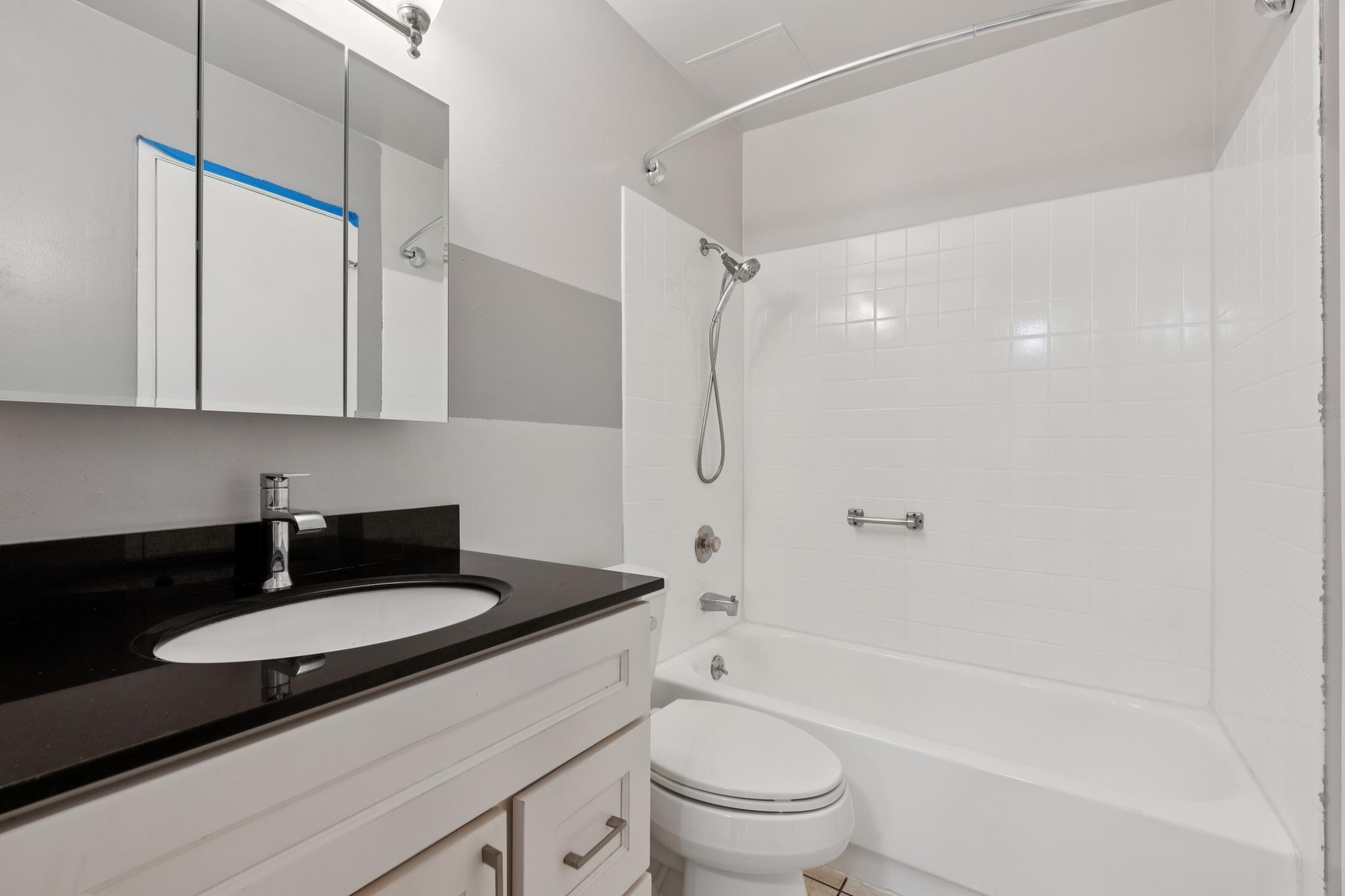 Full bathroom with tub and shower at 9 Commodore Dr A207 in Emeryville, California