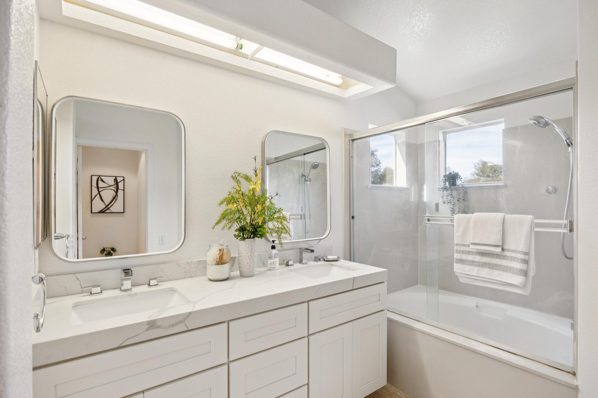 Bright bathroom with tub and shower at 65 Seagull Dr in Richmond