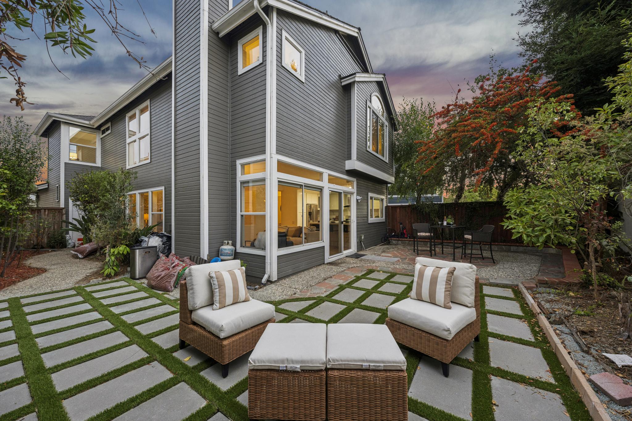 Rear exterior and fenced backyard at 65 Seagull Dr in The Breakers, Richmond