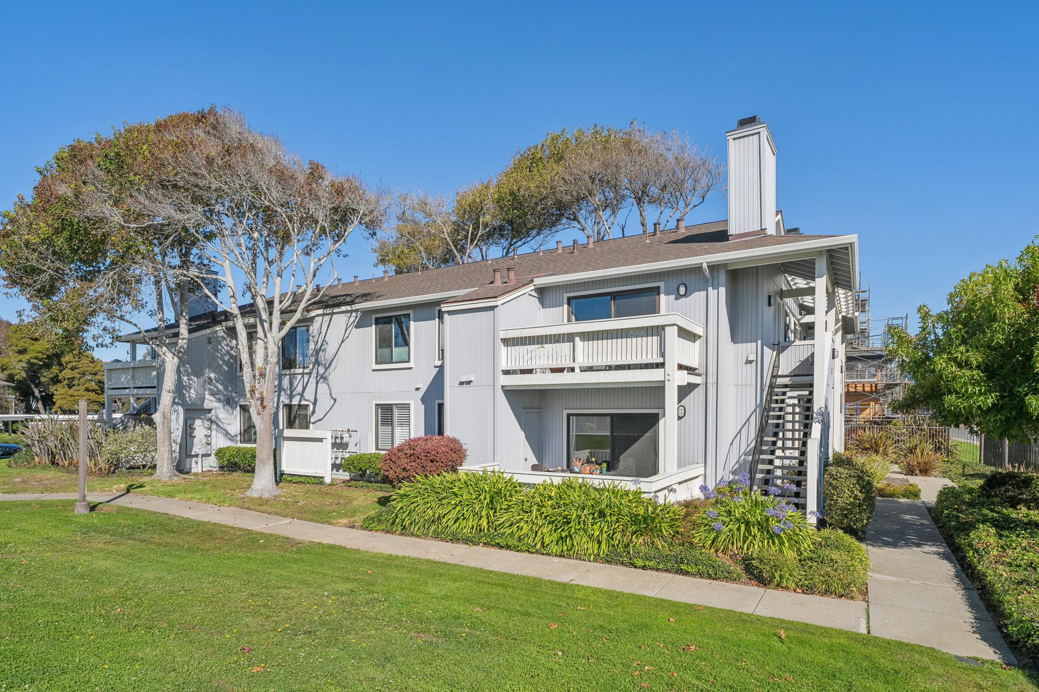 Community exterior and landscaped lawn at 183 Schooner Ct, Marina Bay, Richmond