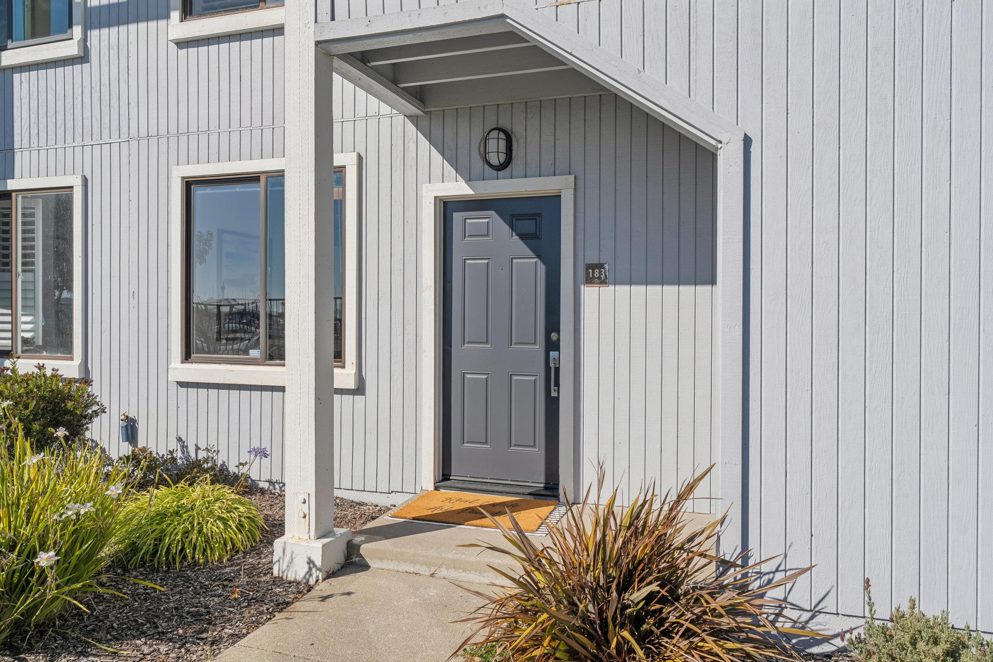 Corner exterior and ground-floor patio at 183 Schooner Ct, Marina Bay, Richmond