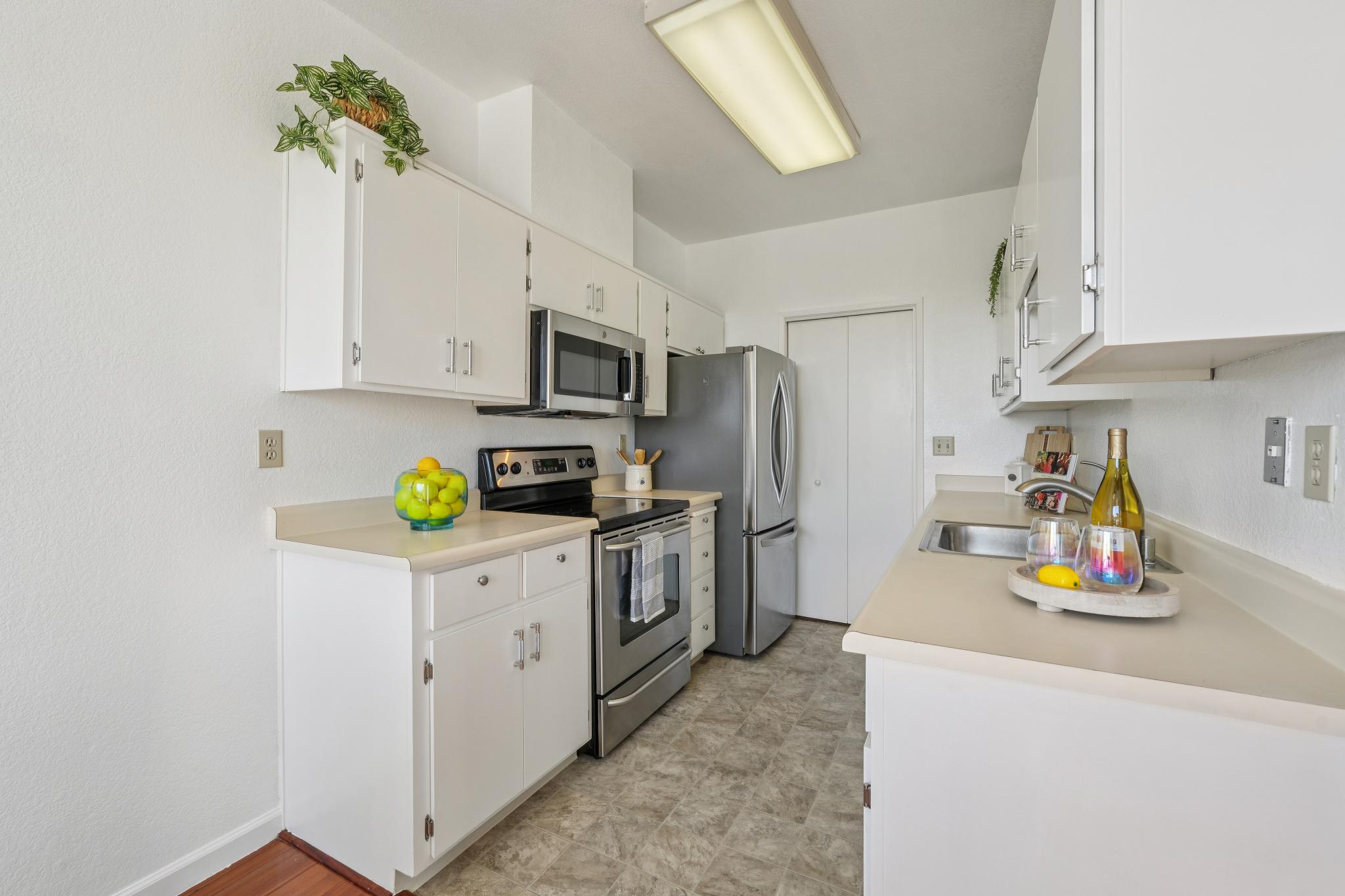 Kitchen with white cabinets at 183 Schooner Ct, Marina Bay, Richmond