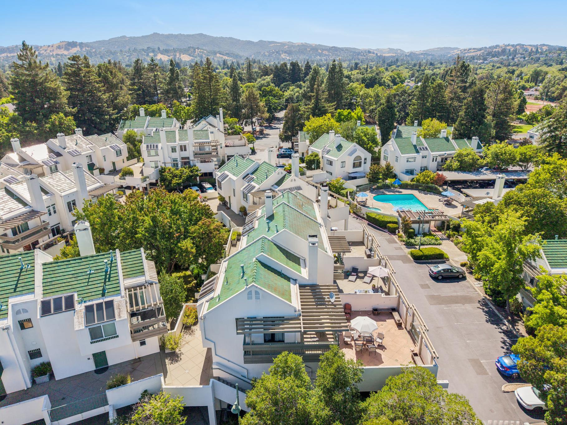 Aerial view of the Two Worlds community and pool near 36 Mozden Ln