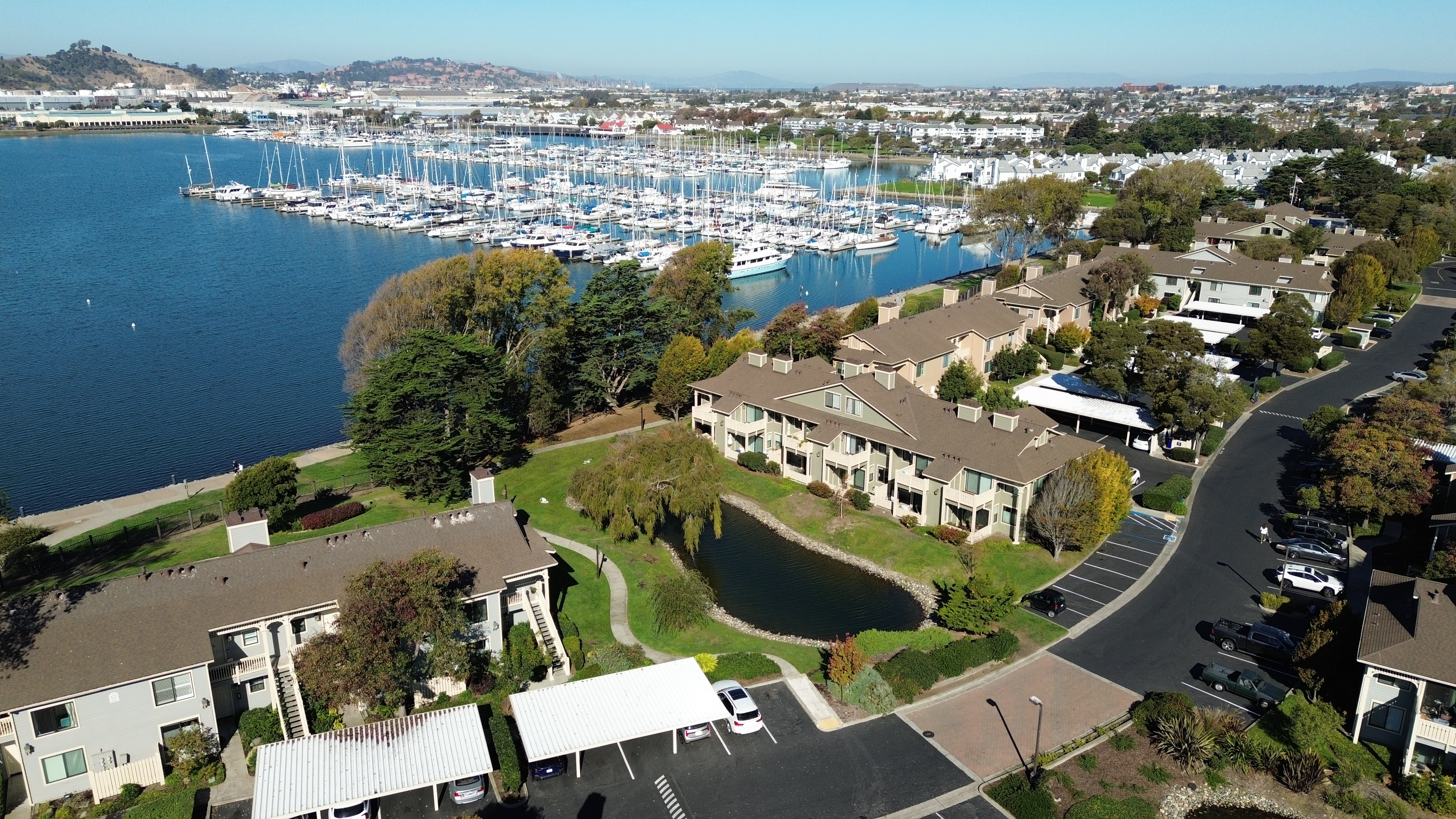 Aerial of the waterfront and condominium grounds near Lakeshore Court in Marina Bay, Richmond
