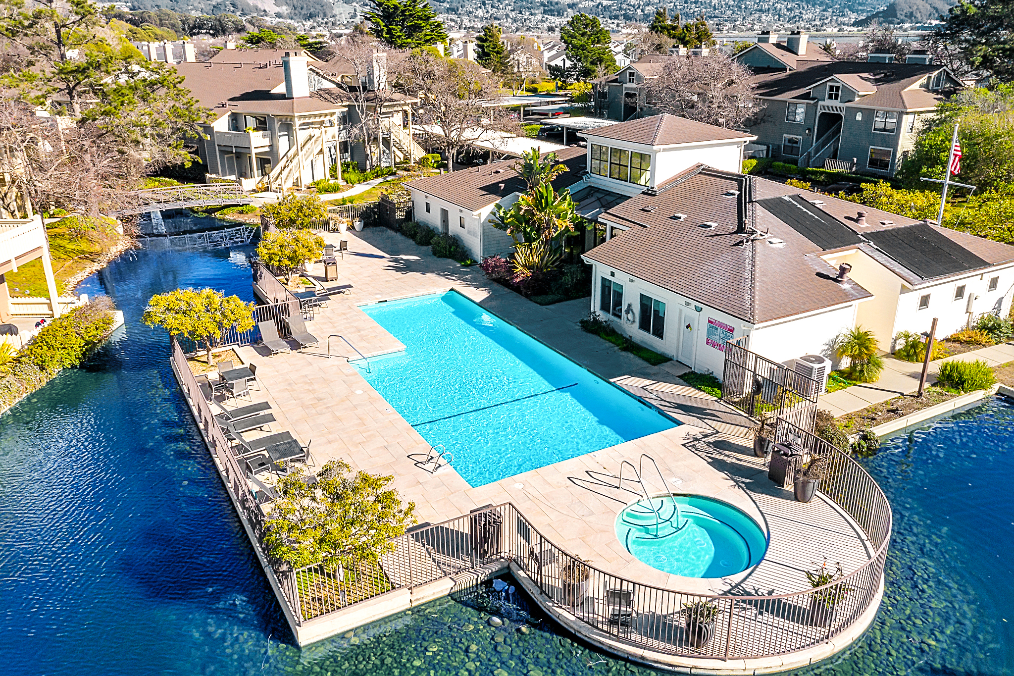 Aerial of the shared pool and lagoon in the Lakeshore Court community, Marina Bay, Richmond