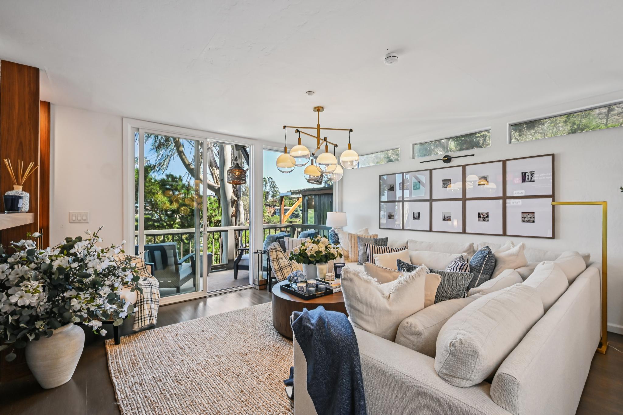 Open living room with fireplace at 103 Marion Ave in Sausalito, CA