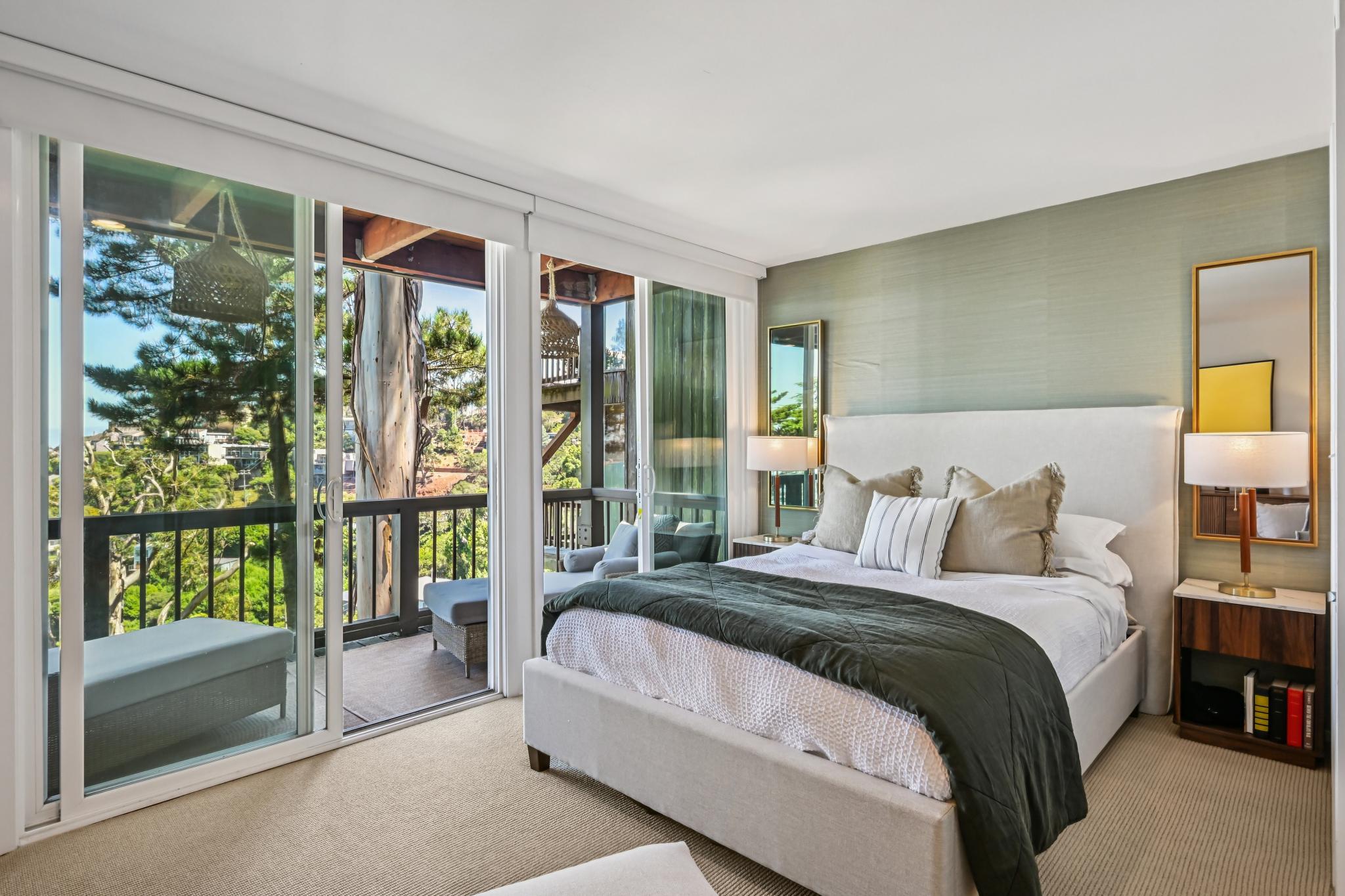 Primary bedroom with deck access at 103 Marion Ave in Sausalito, CA