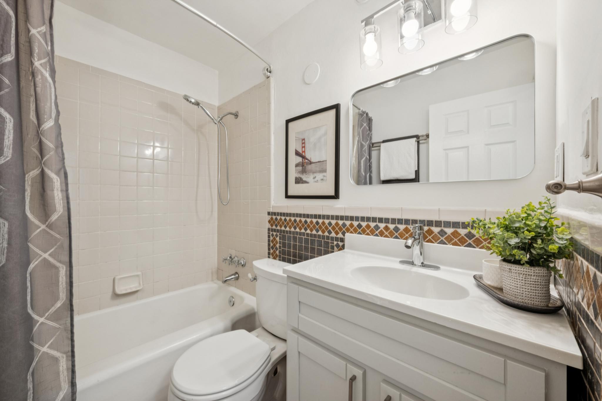 Full bathroom with tub and vanity at 5104 Tehama Ave in Richmond
