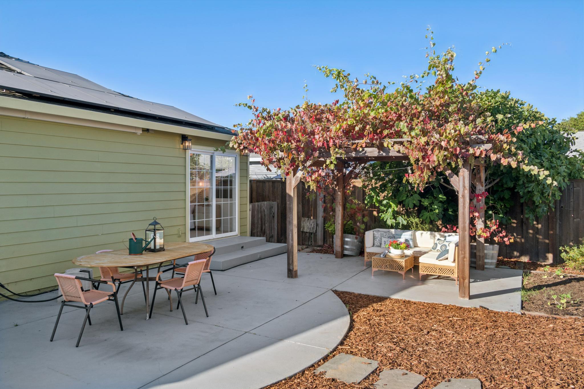 Backyard patio and grapevine-covered trellis at 5104 Tehama Ave in Richmond