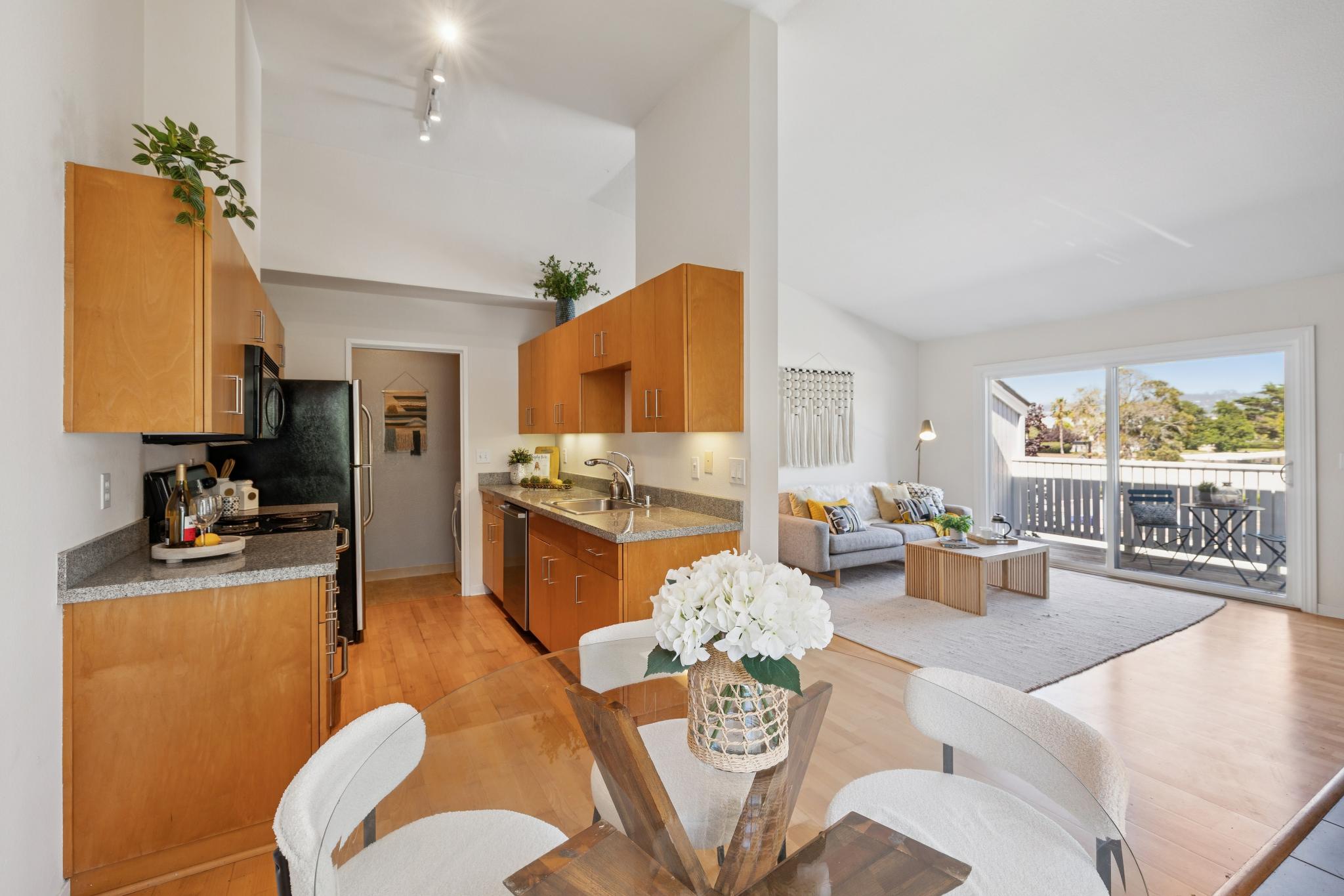 Open living dining and kitchen layout at 6 Schooner Ct, Marina Bay, Richmond