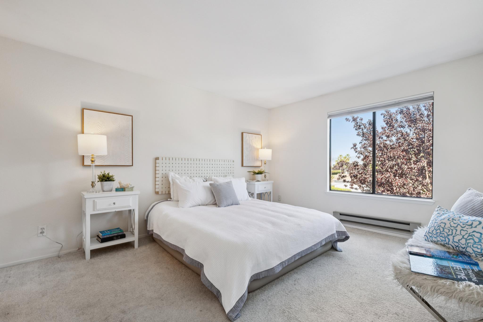 Bedroom with large window at 6 Schooner Ct, Marina Bay, Richmond