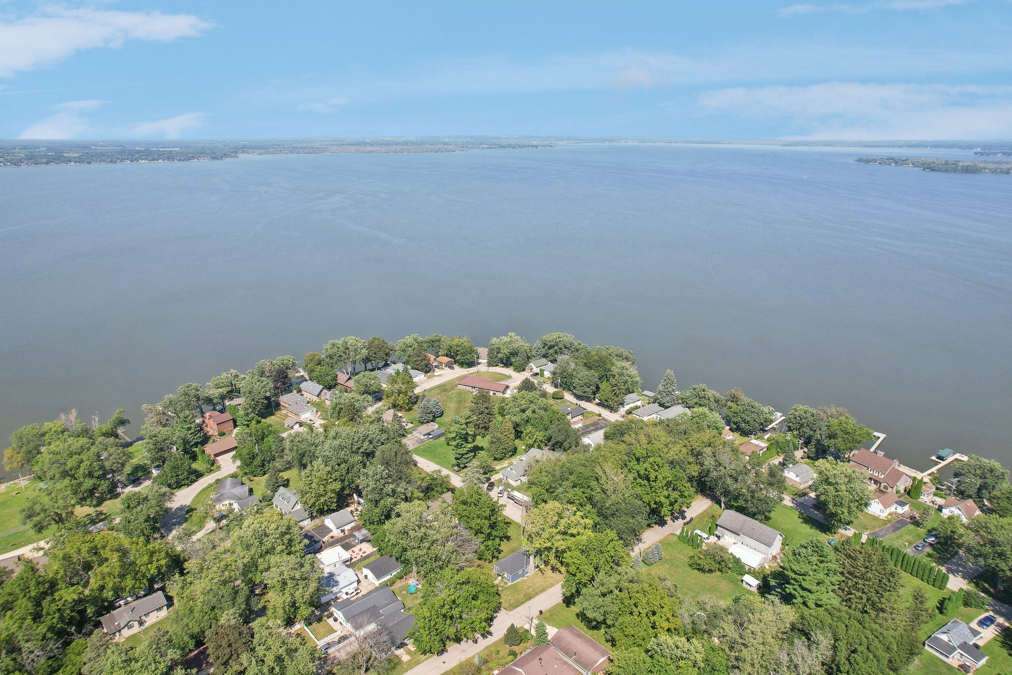 Top Reasons to Choose the Ferraro Real Estate Team for Waterfront Property Sales in Madison, WI header image.