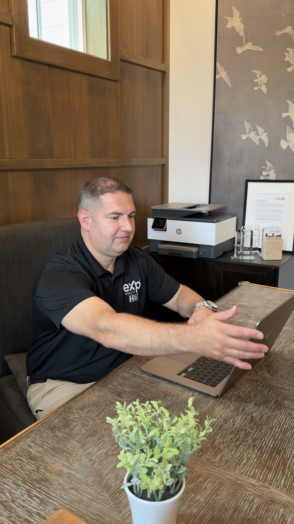 A friendly Lancaster Realtor advises a couple on selling their home.