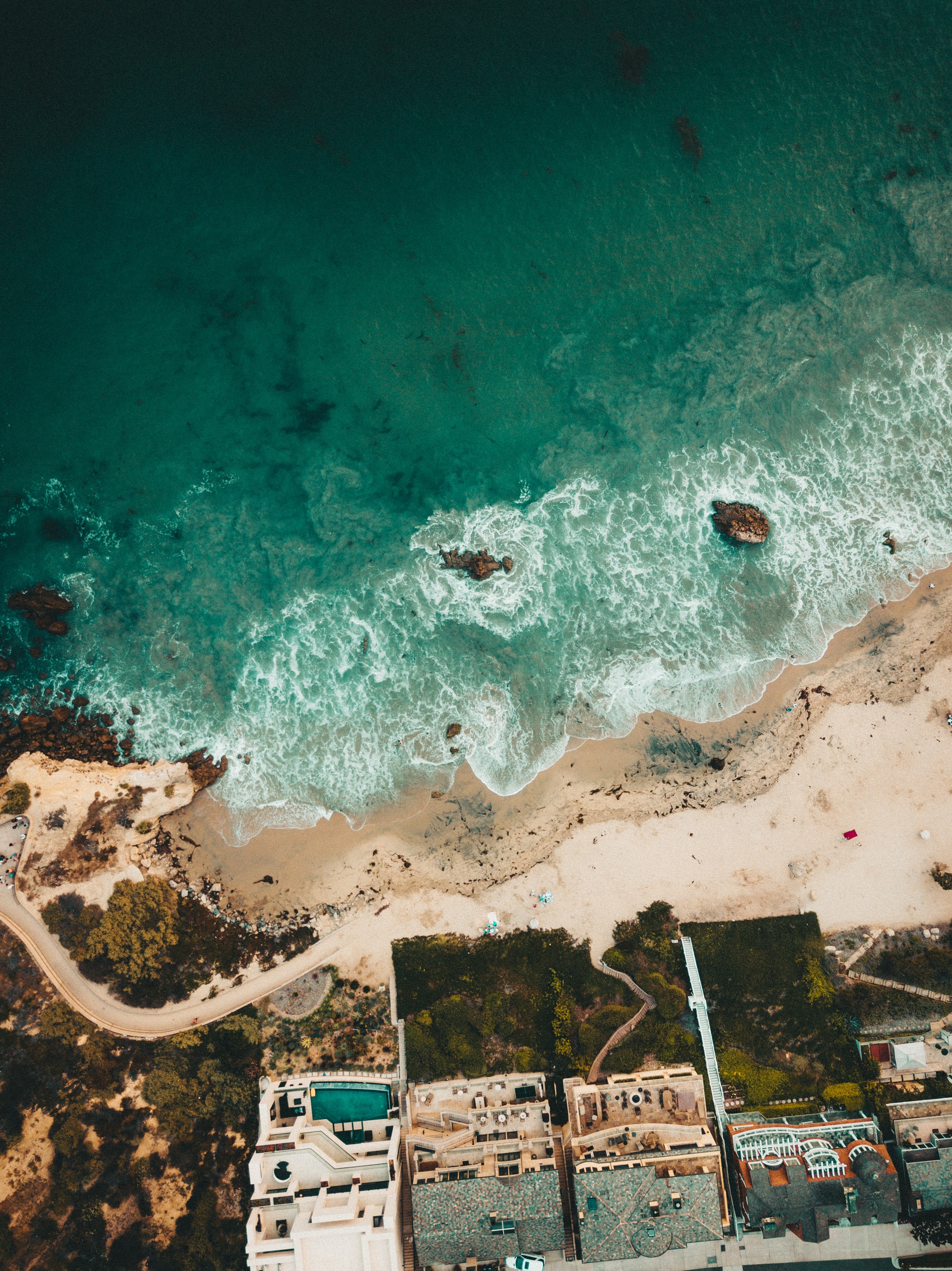 The Complete Guide to Real Estate in Corona Del Mar, CA header image.